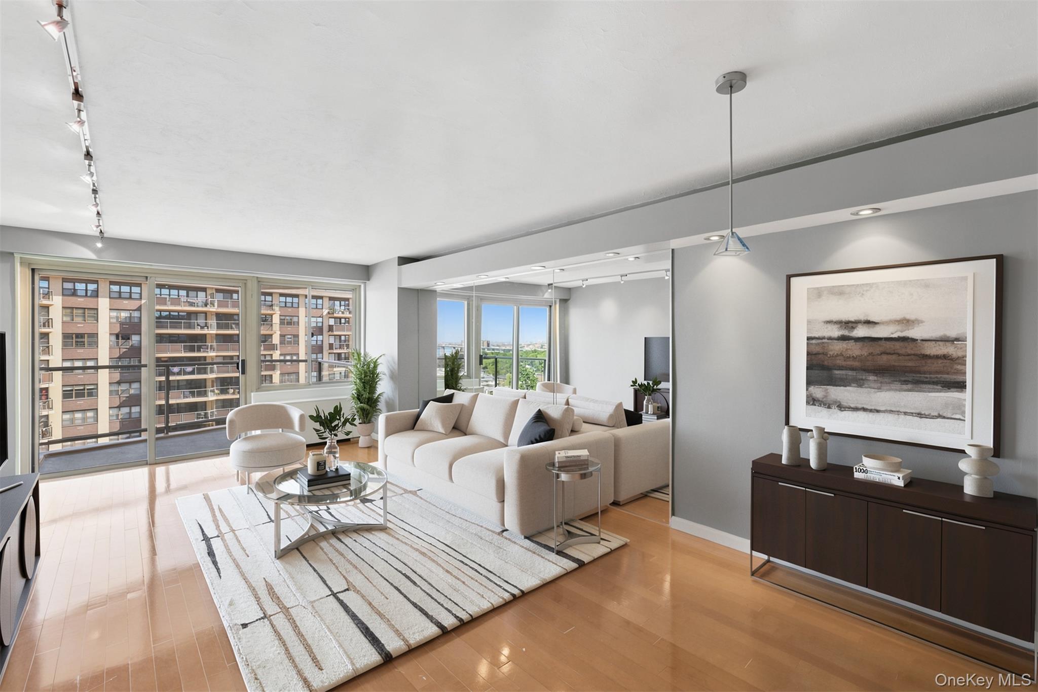 Welcome to Residence 15L at Towers at Water’s Edge, a bright one-bedroom home offering classic high-floor living in one of Bayside’s best-known full-service waterfront communities.The home features a comfortable living and dining area, a spacious bedroom, generous closet space, and a private terrace with beautiful open views. Virtually staged images help showcase the home’s potential, while additional photos show the apartment in its current condition.Residents enjoy a full-service lifestyle with a 24-hour doorman, fitness center, outdoor pool, tennis and pickleball courts, laundry facilities, on-site conveniences, and available parking options. Ideally located near Bay Terrace shopping, waterfront parks, local dining, express bus service, and LIRR access to Manhattan, this home offers comfort, convenience, and value in a well-established Bayside community.Some photos are virtually staged and/or virtually enhanced for visual presentation. Apartment is shown in both staged and current vacant condition.
