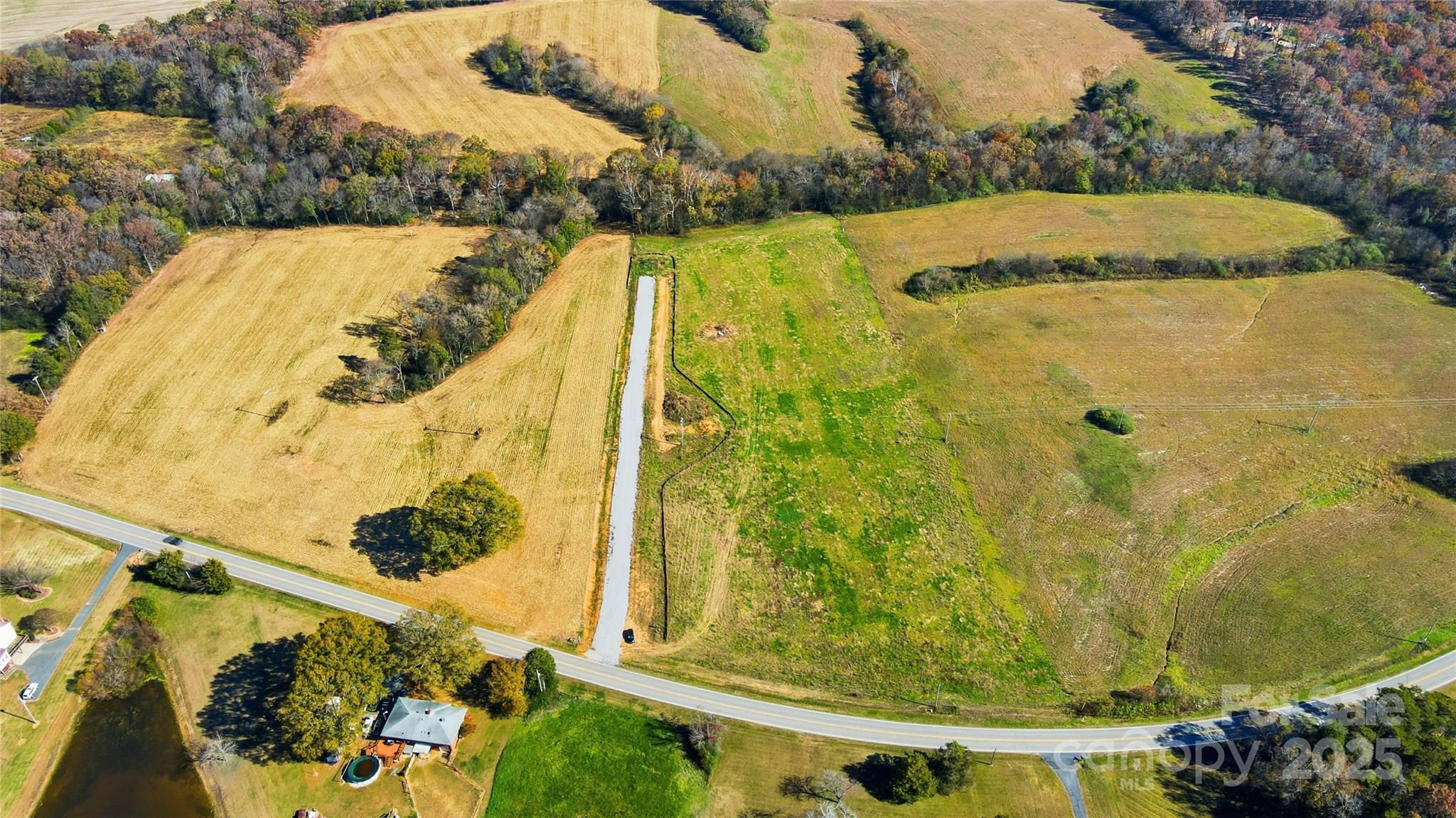 Come build your dream home with Helms Builders, the exclusive builder for this expansive and private property! One of three custom lots available, Lot 3 offers 7.913 acres with mature trees, open views, and incredible space to design a true country estate.Perfectly tucked away yet still close to town, this homesite gives you room to spread out - garden, create outdoor living spaces, or simply enjoy the quiet beauty around you. Choose from one of Helms Builders’ many thoughtfully crafted plans or bring your own plans to build a custom home that fits your lifestyle.Helms Builders provides exceptional craftsmanship and a seamless building experience. Bring your plans and settle into a peaceful countryside lifestyle you’ll love coming home to.