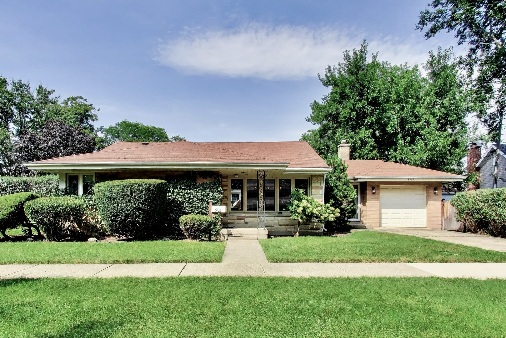Gorgeously remodeled brick ranch featuring a dramatic vaulted great room that seamlessly combines the living room, dining area, and kitchen for a true open-concept feel. Beautifully updated kitchen with quartz countertops and waterfall island. Stunning hardwood floors throughout. Extensively remodeled in 2016, including most major finishes and systems. Two generous-sized bedrooms plus a versatile 3rd bedroom, perfect for a home office or guest room. Dining area opens to a private deck and surprisingly spacious, fully fenced backyard on a 60 x 125 lot. Attached 1 1/2-car garage. No basement (crawl space). One-level living! A fantastic condo alternative with your own yard, no shared walls, and no association fees! Just 2 blocks to the Dee Road Metra station. Award-winning Carpenter Elementary, Emerson Middle, and Maine South High School.