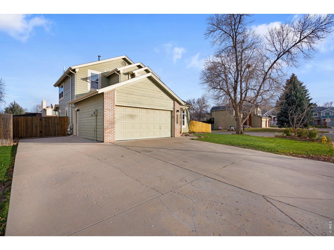 Location, Location, Location!! Welcome home to this beautifully updated 5-bedroom, 4-bathroom residence on a corner lot in desirable Sunstone Village. From the moment you enter, you'll notice the care and craftsmanship that define this thoughtfully designed home. A bright entryway welcomes you with vaulted ceilings, stylish tile flooring, and a custom-crafted banister that sets the tone for the updates throughout. Gather in the inviting living room, where a refinished gas fireplace with a custom maple mantle creates a warm focal point. The designer kitchen, completely reimagined in 2022, features quartzite countertops, maple cabinetry, and near-new stainless steel appliances, including a gas range ideal for everyday cooking and entertaining.Upstairs, the bedrooms offer comfort and quiet, complemented by new carpet. The house is completed with an energy-efficient furnace and water heater to newer windows and trim. Exit outside to a serene backyard oasis, perfect for morning coffee or evenings under the Colorado sky. With modern updates and timeless appeal, this Sunstone Village home is ready to welcome you.