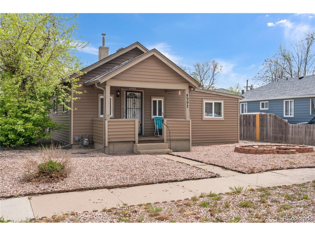 Located in Denver's Berkeley neighborhood, this charming ranch offers a wonderful combination of original character, modern finishes, and comfortable living spaces. The bright and inviting living room features warm luxury vinyl plank flooring and plenty of natural light, creating a welcoming feel throughout the home. The floor plan flows into a cozy additional sitting area and formal dining space, offering plenty of flexibility for entertaining or everyday living.The kitchen has been tastefully updated with beautiful quartz countertops, shaker-style cabinetry with soft-close doors and full-extension drawers, newer appliances, and a stylish tile backsplash. The open layout connects the kitchen to the surrounding living spaces, making it both functional and inviting. The home also features a primary bedroom, an additional bedroom, and a versatile flex space that would make a great home office, workout area, or reading room. Original wood doors and thoughtful architectural details add warmth and personality that set this home apart.Situated on a corner lot, the property offers a fenced backyard with room for outdoor entertaining, gardening, or relaxing. A detached garage provides additional convenience, while improvements including a newer furnace, updated plumbing, and a refreshed kitchen add to the home's appeal.The location is another major highlight! Enjoy everything the Berkeley neighborhood has to offer, including the popular shops, restaurants, breweries, and coffee spots along Tennyson Street. Berkeley Lake Park, nearby trails, and outdoor recreation are all within easy reach. With convenient access to I-70, downtown Denver, and the mountains, this location makes it easy to enjoy the best of Colorado living.Full of charm, thoughtfully improved, and located in one of Denver's most sought-after neighborhoods, this Berkeley ranch is a wonderful place to call home.