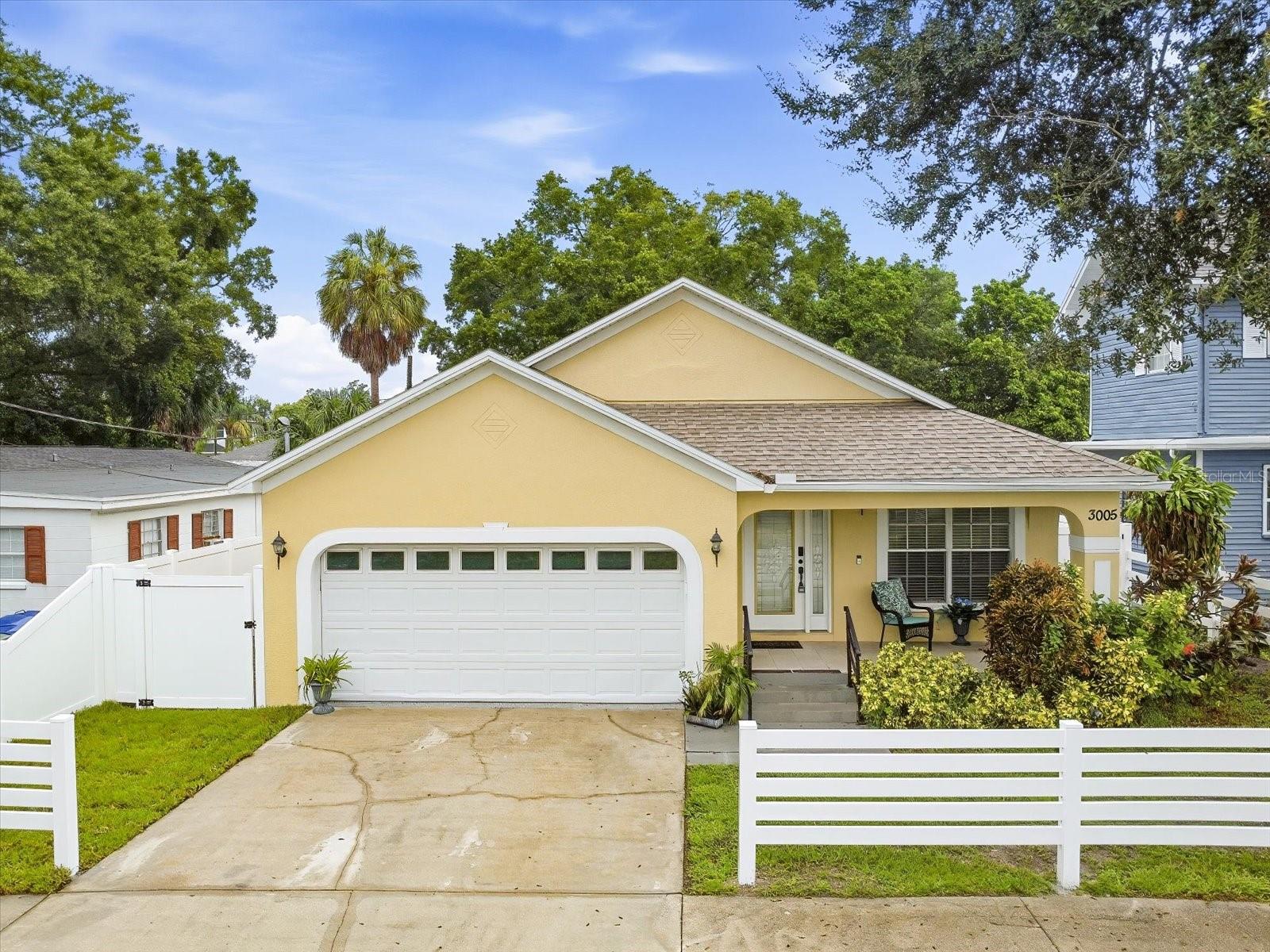 Welcome home to this beautifully refreshed 3-bedroom, 2-bath home with a 2-car garage in a fantastic central Tampa location! Fresh interior paint and brand-new flooring create a bright, inviting atmosphere throughout. The spacious living and dining combination flows into a kitchen featuring wood cabinetry, newer stainless-steel appliances and a breakfast bar overlooking the family room.The separate primary suite offers a large walk-in closet and an en-suite bathroom with a garden tub and separate walk-in shower. Sliding glass doors lead from the family room to a newly turfed backyard with brand-new privacy fencing, creating a beautiful, low-maintenance outdoor retreat. An indoor laundry room adds everyday convenience.Enjoy peace of mind with major recent improvements, including a 2025 roof, A/C and solar panels that convey, a 2026 water heater, fresh interior and exterior paint, brand new flooring throughout the home and new fencing.Ideally situated near Raymond James Stadium, Midtown Tampa, Downtown Tampa and Tampa International Airport, with convenient access to the Beautiful Florida Beaches,  shopping, dining, entertainment and major roadways. All measurements are approximate and to be confirmed by buyer.Schedule your private showing today!