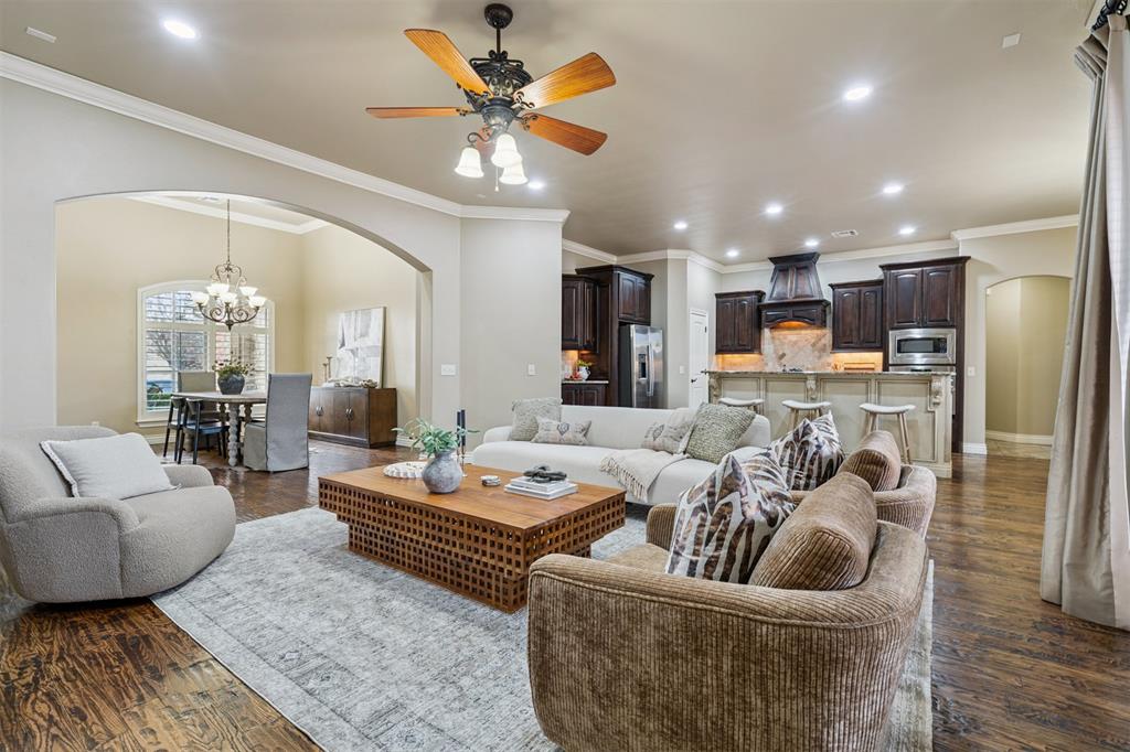 Step inside and immediately be welcomed by an open and inviting floor plan. To your left, a spacious formal dining room is perfect for hosting gatherings, while to the right, you’ll find a private study, a secondary bedroom, and a full bath. The kitchen is a chef’s dream, featuring stainless steel appliances, granite countertops, bar stool seating, and a generous walk-in pantry. Downstairs, two additional secondary bedrooms share a convenient Jack-and-Jill bath, while the private primary suite sits on the opposite side of the home. The primary bedroom includes dual closets and a spa-like ensuite with double vanities and a walk-in shower. Upstairs offers a versatile bonus room—ideal for a game room, theater, or playroom—along with a half bath and excellent storage space. Outside, enjoy a large covered patio, spacious backyard, and a 3-car garage for all your parking and storage needs. Recent upgrades include a brand-new roof and gutters with high-impact shingles (December 2023) and a new oversized hot water heater (2024). This home truly combines thoughtful design with modern updates—ready for you to make it yours!