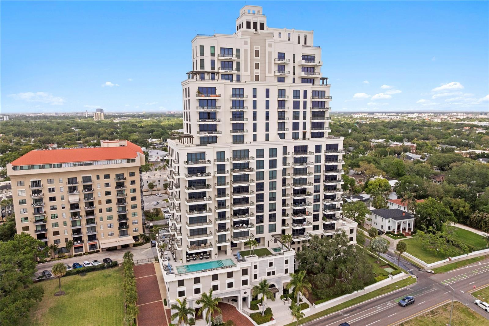 Truly one of a kind, this is the type of condominium you have likely never seen come to market—where craftsmanship, customization, and finish rival those of private estates. Located in the coveted Hyde Park House, this residence features the largest terrace of all 70 units in the building. Offering over 7,000 square feet of total living space, including 3,619 square feet of interiors and a 3,575-square-foot private terrace, the home delivers a lifestyle that lives more like a private residence than a condominium. Positioned along iconic Bayshore Boulevard and just moments from Hyde Park Village, it combines prestige with walkability. The Desoto floor plan includes three bedrooms, three and a half baths, a private office, and an additional den. Since purchase, the residence has undergone a comprehensive renovation, with nearly every inch thoughtfully reimagined. Features include quarter-sawn oak flooring, custom wood wall treatments, pecky cypress beams, and a refined palette by Farrow & Ball. A kitchen, bar, and primary bath designed by world-renowned designer Christopher Peacock showcase custom cabinetry, 2.5-inch marble countertops, and full-height marble backsplashes. Additional highlights include Visual Comfort lighting, custom built-ins, and integrated cabinetry throughout. A rare offering defined by exceptional design, expansive outdoor living, and a truly elevated condominium lifestyle-come and view this exceptional property today.