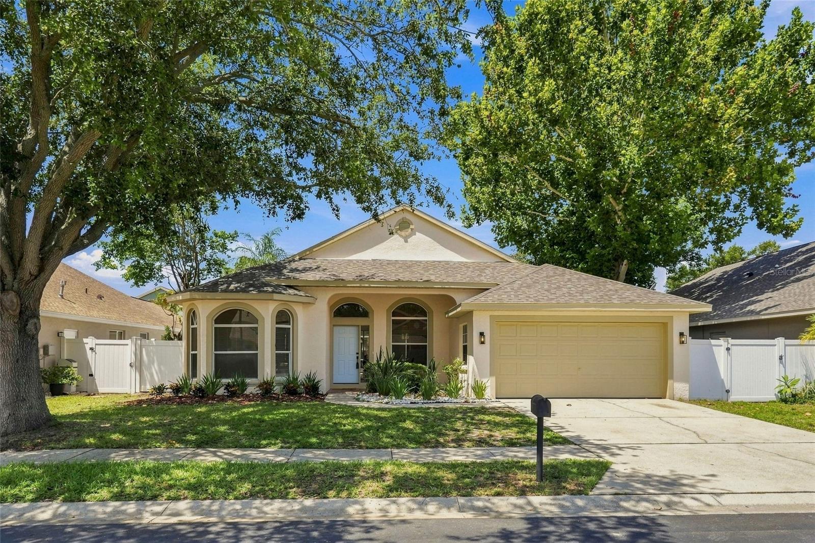Stunning Renovated 4-Bedroom, 2.5-Bath Pool Home in Gated Forest Ridge – A Tarpon Springs Sanctuary! Welcome to your dream home in one of historic Tarpon Springs’ most sought-after gated communities. This beautifully remodeled 4-bedroom, 2-bath pool home offers over 2,000 square feet of thoughtfully designed living space, blending modern style with everyday comfort. At the heart of the home is a show-stopping eat-in designer kitchen featuring sleek modern cabinetry, luxurious quartz countertops, premium stainless-steel appliances, and a bright dining nook- all overlooking the pool and family room with fireplace. Brand-new luxury vinyl flooring flows through the open-concept living areas, creating a warm, elegant atmosphere throughout. The serene primary suite is a true retreat, complete with sliding glass doors overlooking the pool and lanai, dual sinks, and a spa-inspired en-suite bathroom. The split-bedroom layout includes two additional bedrooms and a fully updated second bathroom, offering privacy and convenience for family or guests. Step outside to your personal paradise—an inviting screened-in pool and lanai perfect for year-round enjoyment. A fenced yard, newer HVAC system, newly refinished pool, and new pool equipment provide peace of mind for years to come. This home is a rare find in NO FLOOD ZONE and ideally located just minutes from the iconic Tarpon Springs Sponge Docks, historic downtown, Sunset Beach, Howard Park Beach, and the Pinellas Trail. Enjoy the cultural charm of Craig Park overlooking Spring Bayou, where manatees and dolphins are often spotted. Residents love year-round events including First Fridays, art shows, live music at Sunset Beach, and seasonal festivals. Golf courses, marinas, and top outdoor recreation are all nearby, with easy access to airports and a short drive to Caladesi Island and Clearwater Beach. This exceptional property offers not just a home, but an unmatched Florida lifestyle. Don’t miss your chance to make it yours!