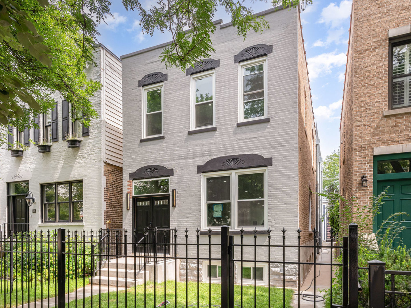 Welcome to 1433 N Oakley - a refined urban retreat in the heart of Wicker Park. Step into sophistication in this stunning architectural gem nestled in one of Chicago's most vibrant neighborhoods. With over 3,400 sq ft of meticulously designed living space across three levels, this 4-bedroom, 4.1-bathroom residence seamlessly blends the tranquility of suburban living with the energy of city life. A recent addition has elevated the home's footprint and functionality, showcasing a thoughtfully designed open-concept main level. Here, a chef's dream kitchen awaits-featuring custom cabinetry, a massive center island, top-of-the-line Thermador appliances, and newly installed hardwood flooring. The layout flows effortlessly into the dining room, living room, family room, stylish powder room, and a practical mudroom. Upstairs, you'll find three generously sized bedrooms, each with its own en-suite full bathroom. The primary suite is a showstopper-bathed in natural light and outfitted with high-end finishes, offering a spa-like retreat. A convenient second-floor laundry room adds everyday ease. The fully finished lower level is ideal for entertaining or relaxing, complete with a spacious recreation room complete with wet bar, ample storage, a fourth bedroom/office, and an additional full bath. Outside, the home boasts professional landscaping, a 2-car garage, and a private rooftop deck-perfect for enjoying city views or hosting guests. Located just steps from the best of Wicker Park, you're within walking distance to award-winning restaurants, boutiques, scenic parks, trendy cafes, yoga studios, transit, and the 606 trail. This is more than a home-it's a one-of-a-kind lifestyle experience where luxury, comfort, and location converge.