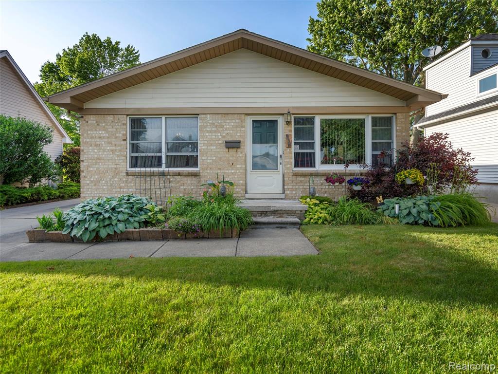 Discover this spacious 3-bedroom, 2.1-bath ranch in Wyandotte, offering comfort, functionality, and well-appointed living space throughout. The primary suite features a walk-in closet and private half bath. Enjoy a bright, open kitchen with a peninsula, a large living room, and a separate dining area—perfect for everyday living or entertaining. The finished basement is a true highlight, featuring a full second bathroom, a large rec room with a bar, pool table, sofa bed, smart TV, and more. It’s been thoughtfully finished with insulated walls, sealed concrete floors, and a drop ceiling—ready to enjoy right away. Additional features include Anderson high-performance double-hung windows, gutter guards, and updated mechanicals. Outside, you'll find a fenced backyard and a 2-car detached garage. This home has been lovingly maintained as a non-smoking, pet-free home from day one. Location is unbeatable—just 2 blocks from the golf course and 3 blocks to the river, offering easy access to outdoor recreation and beautiful views. Best of all, all furnishings stay—just move in and make it yours!