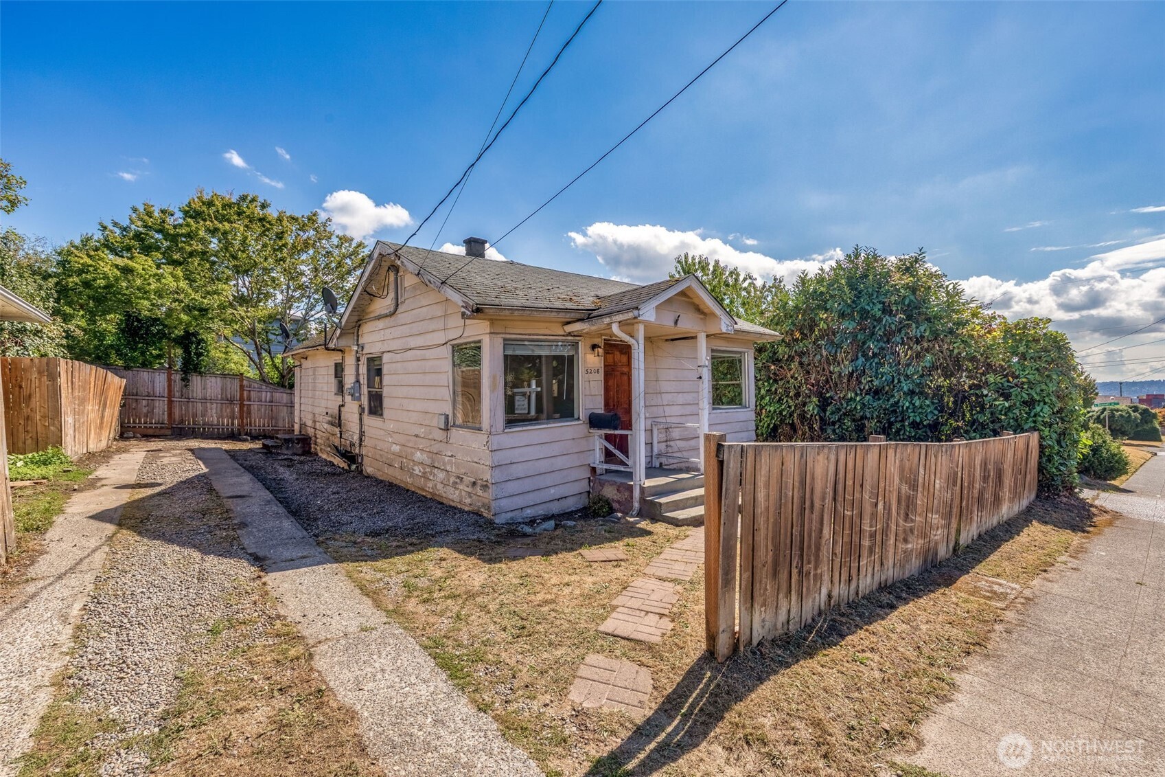 Looking for your next project? This charming 2Br/1Ba fixer offers an efficient layout on a sunny corner lot, making it a compelling opportunity for investors, flippers, builders, developers, or hands-on buyers. The level 3,157 sq. ft. lot borders an alley, creating design flexibility and potential floor-area-ratio advantages for redevelopment. Inside, the one-story home features a light-filled living and dining area, a large front bedroom, a functional central kitchen, a second good-sized bedroom, and an oversized laundry/storage area. Outside, the partially fenced yard includes mature landscaping and a long driveway with space for three uncovered parking spots or possible RV parking. Located near transit, with a bike score of 74 and a walk score of 66, the property offers easy access to historic Georgetown cafes, breweries, and restaurants. Do not miss this opportunity to own one of the lowest-priced properties in sought-after Beacon Hill.