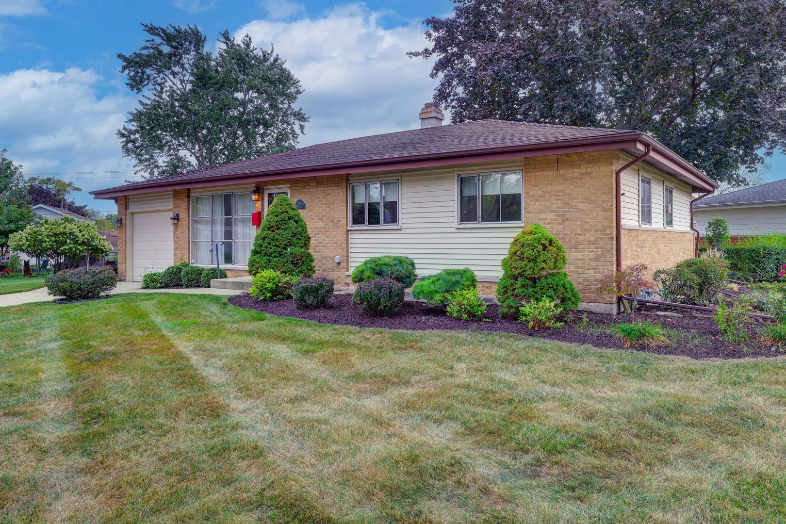 Welcome to this charming 3-bedroom, 1.5-bath ranch with a full basement, proudly offered by the original owner and tucked away on a quiet cul-de-sac. This is a solid, well-kept home with great space inside and out!    The bright and inviting living room features a large picture window that fills the space with natural light. The eat-in kitchen offers 42-inch cabinetry, Corian countertops, hardwood flooring, recessed lighting, large windows, and a lighted ceiling fan. The full bath features a custom vanity and tub/shower with tile surround, while the spacious primary bedroom includes a double-door closet and ceiling fan.    Downstairs, the full, partially finished basement adds valuable living space with a comfortable family room featuring recessed lighting, plus two large storage rooms with plenty of space for organization, hobbies, a workshop, or future finishing possibilities. Outside, enjoy the large, beautifully landscaped backyard with a storage shed and plenty of room for relaxing, gardening, entertaining, or simply enjoying the outdoors. An attached 1-car garage adds everyday convenience.    A well-cared-for, original-owner home in a fantastic cul-de-sac location-close to shopping, dining, parks, great schools, and everything Hoffman Estates / Schaumburg has to offer!
