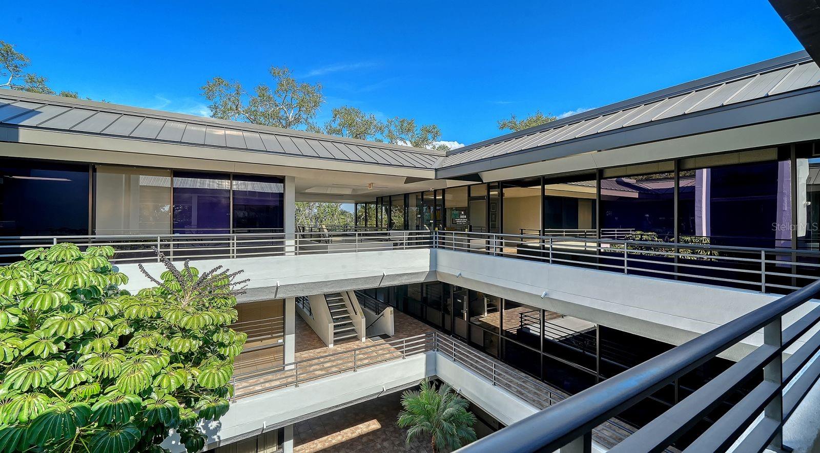 The OFFICE PARK at Gateway and Stickney Point. 3rd Floor, "303-B". Units #57-60 is currently leased to a tutoring service and is leased through 5/31/2026.  Monthly rent is $2,200. The elevator is right across from these units.  There is a waiting room and many small offices with a total of 11 rooms.  Rooms could be opened and divided for larger office space if needed. There is parking lot that offers lots of open parking. The atrium configuration makes for a pleasant setting. This is a great location which is near Gulf Gate and all of the shops and restaurants.  It is also near US 41 and the South bridge to Siesta Key.  It is less than 4.5 miles to I-75. This office park is situated near Esplanade at Siesta Key.  Purchase this as an investment; use one space for yourself and rent out the rest! Please allow adequate time to notify the current tenant for the showing.