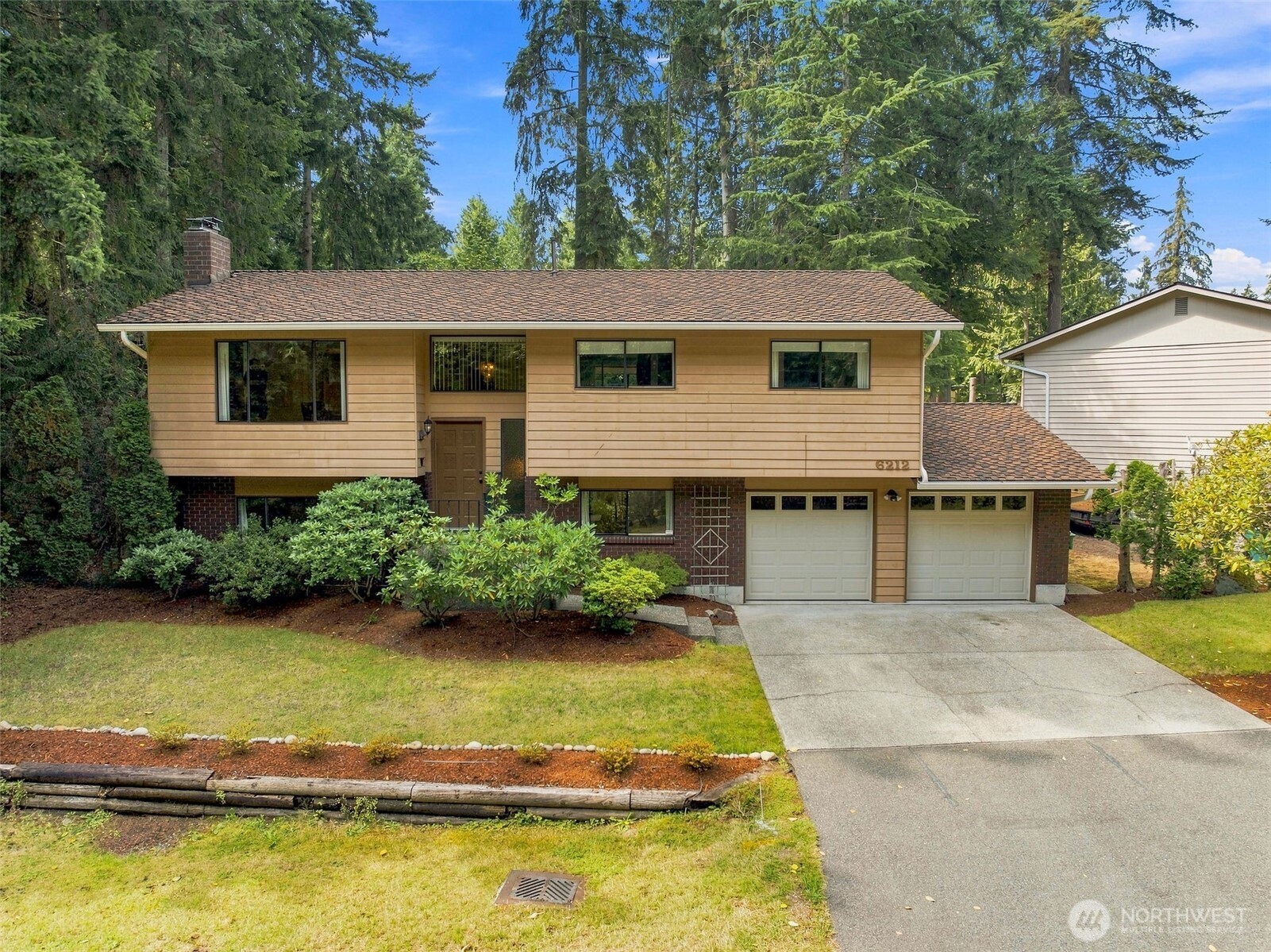 Meticulously maintained and offered for the first time since 1982, this versatile residence combines timeless character with exceptional care. The home identifies as 4 bedrooms—with the lower-level bedroom designated as non-conforming—and features 3 bathrooms, offering expansive living spaces that easily accommodate a large household or multigenerational arrangements. Major updates providing total peace of mind include a new roof with a 50-year warranty (12/2025), leaf gutter guards, new kitchen appliances (5/2025), a backup generator, and new garage doors. Outside, the serene, regularly manicured backyard serves as a private retreat, while nearby top-rated schools, shopping, parks, and beaches offer ideal daily convenience. Whether you choose to enjoy its original charm or bring your own modern design updates, this move-in-ready property presents a rare opportunity in a prime location.