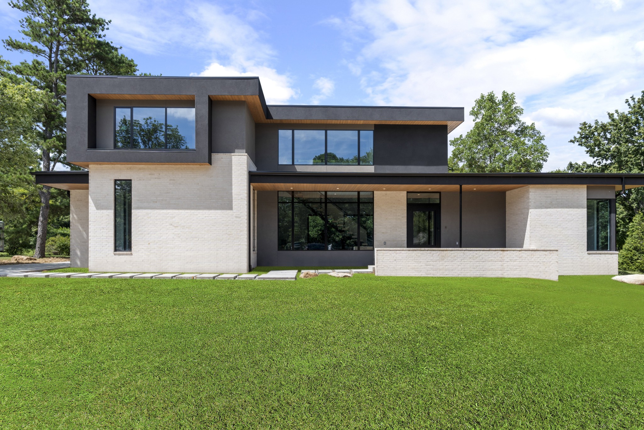 RARE opportunity to participate on the architectural design level with the developer for one of two homes being built at 5709 Cloverland Dr. The architecture is in the design phase with the award-winning Ryan Thewes and the buyer can contract now to customize the design as well as finishes and selections. The site will offer incredible views from the main level and second floor. The design will feature Sub-Zero and Wolf appliances, Nashville Modern Cabinetry, lux design elements, 10' garage doors for three garage bays and a private, gated motor court for security and convenience. The current plan is a modern design with 6 bedrooms 6 bathrooms and 2 half baths. Call to inquire for more information. The listing agent is available to meet at the site. Don't miss your chance to have a custom-built home in the heart of Brentwood.