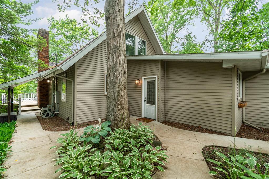 Welcome to this stunning lakeside retreat at 7670 Five Lakes Dr, Farwell, MI! Nestled on over an acre of picturesque waterfront land, this enchanting 4-bedroom, home offers lakefront living with over 105 feet of water frontage and mesmerizing lake views. Step inside to be greeted by a spacious, sunlit kitchen adorned with rich, dark wood cabinetry, sleek stainless-steel appliances (chefs stove), and a stylish countertop island. A cozy family room with wood-burning fireplace. The huge living room, featuring a warm fireplace (gas), provides a perfect place for relaxation and enjoyment with the extended family. The inviting multi-level deck, seamlessly accessible from the living areas, provides an idyllic space for outdoor entertaining with serene lake views as your backdrop. Imagine evenings by the outdoor fire pit, with lush green trees all around. Additional features of this impressive property include a 24 kw Generac whole home generator (2022), two new furnaces (2024), two new central air units (2024), roof (2018), and a newer water treatment system. A relaxing spa adds a touch of luxury to this already impressive home. Two wooded lots across the street offer opportunities for additional building. Surrounded by beauty and designed for comfort, this captivating lakeside home is one of the largest on Five Lakes which is an all sports lake. Experience the perfect blend of nature and modern living at this charming Lakehouse. This home is ADA accessible with Chair lifts (negotiable) and grab bars. Dont miss your chance to call this tranquil retreat your own.