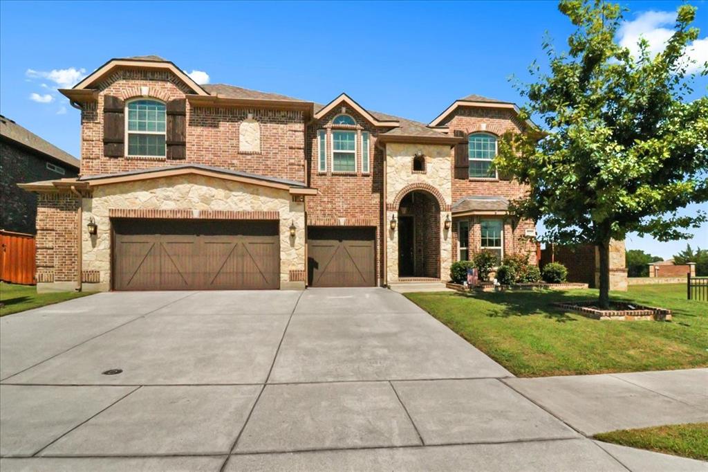 Exceptional Steadman Farms home with every room you could want! Located in Keller ISD, this 5-bedroom, 4-bath home has an office, a flex room being used as a 2nd office currently-both on the 1st floor. Also, a game room and a media room upstairs.  Home offers show-stopping curb appeal and is situated on an oversized lot.  Once inside, you are greeted by soaring double-story ceilings, an impressive breezeway, a dramatic corridor, elegant archways, and a striking floor-to-ceiling stone fireplace. Rich hardwood flooring flows throughout the main living areas, creating warmth and sophistication. Perfect for entertaining, the elegant formal dining room seamlessly connects to the expansive gourmet kitchen and sunny breakfast nook—ideal for hosting holiday gatherings. The kitchen is a chef’s dream, featuring antique white custom cabinetry, a gas cooktop, double ovens, a large center island, a butler’s pantry, and a walk-in pantry. The main-level primary suite is a private retreat, complete with a tray ceiling, spa-inspired ensuite bath, oversized walk-in closet, jetted tub, and walk-in shower with 2 shower heads. 4 additional bedrooms, a Jack and Jill bathroom, and a secondary bath complete the 2nd level. Smart home features throughout, a 3-car garage with a level 2 EV charger, and a large backyard with a covered patio—perfect for weekend BBQs or relaxing evenings outdoors. Low HOA dues give you access to the community, pool, park, and playground.  You'll love the quick access to an array of entertainment, shopping & restaurants to enjoy! Don't miss the opportunity to call this beautiful home yours!