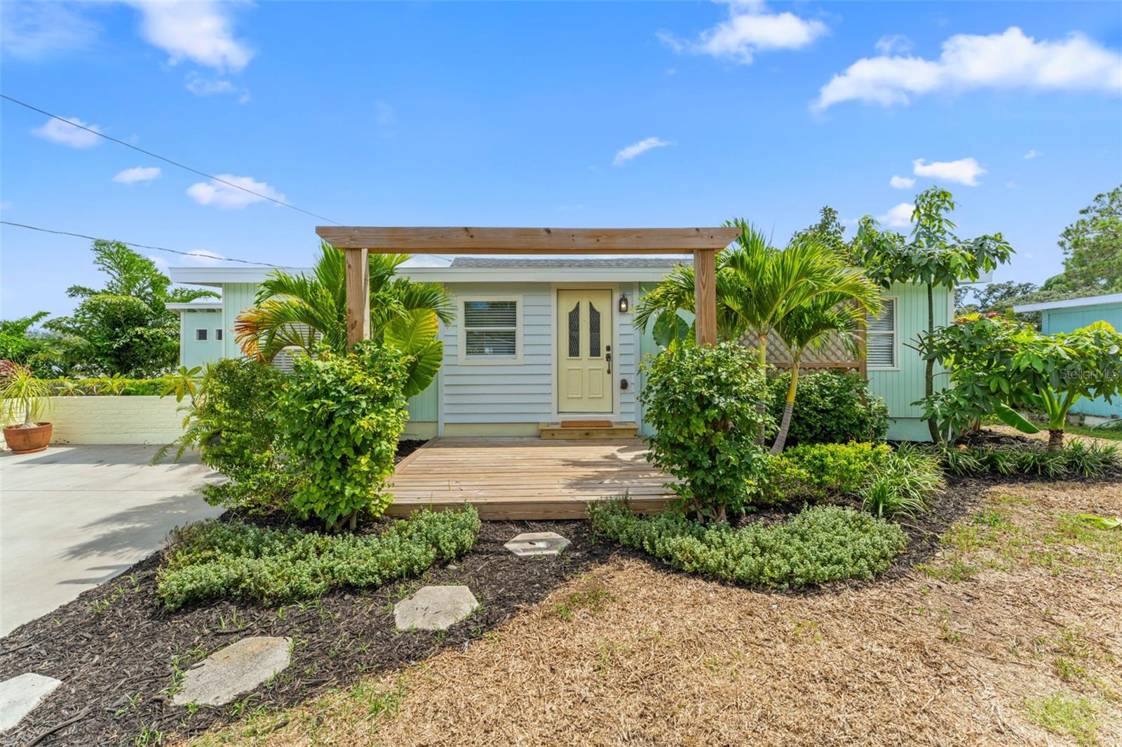 FULLY RENOVATED & MOVE-IN READY! Welcome to this beautifully updated 2-bedroom, 2-bath home in Pinellas Park. Both bedrooms feature walk-in closets and ensuite bathrooms, fully renovated with modern finishes for comfort and style. The kitchen has also been completely remodeled with new finishes, appliances, and details that make it the heart of the home.

Major updates include a newer roof (2022) plus a full list of BRAND NEW 2025 renovations: all-new plumbing and electrical wiring, luxury vinyl plank flooring, fresh interior and exterior paint, raised ceilings in both bedrooms, new drywall and trim, new window blinds, and individually controlled AC units in every room. For added peace of mind, the home also comes with one-year warranties covering AC units, major appliances, plumbing labor, electrical labor, and workmanship.

Outside, lush landscaping and a welcoming garden entry lead to a private backyard oasis and a detached flex space with its own AC unit and windows for natural light and year-round usability. Whether you need a home office, studio, or she-shed, this versatile bonus area is ready to fit your lifestyle.

Less than 20 minutes to Downtown St. Pete and Gulf beaches, with quick access to US-19, I-275, and the Gandy Bridge. All the hard work has been done, so now it’s time to enjoy your new home!