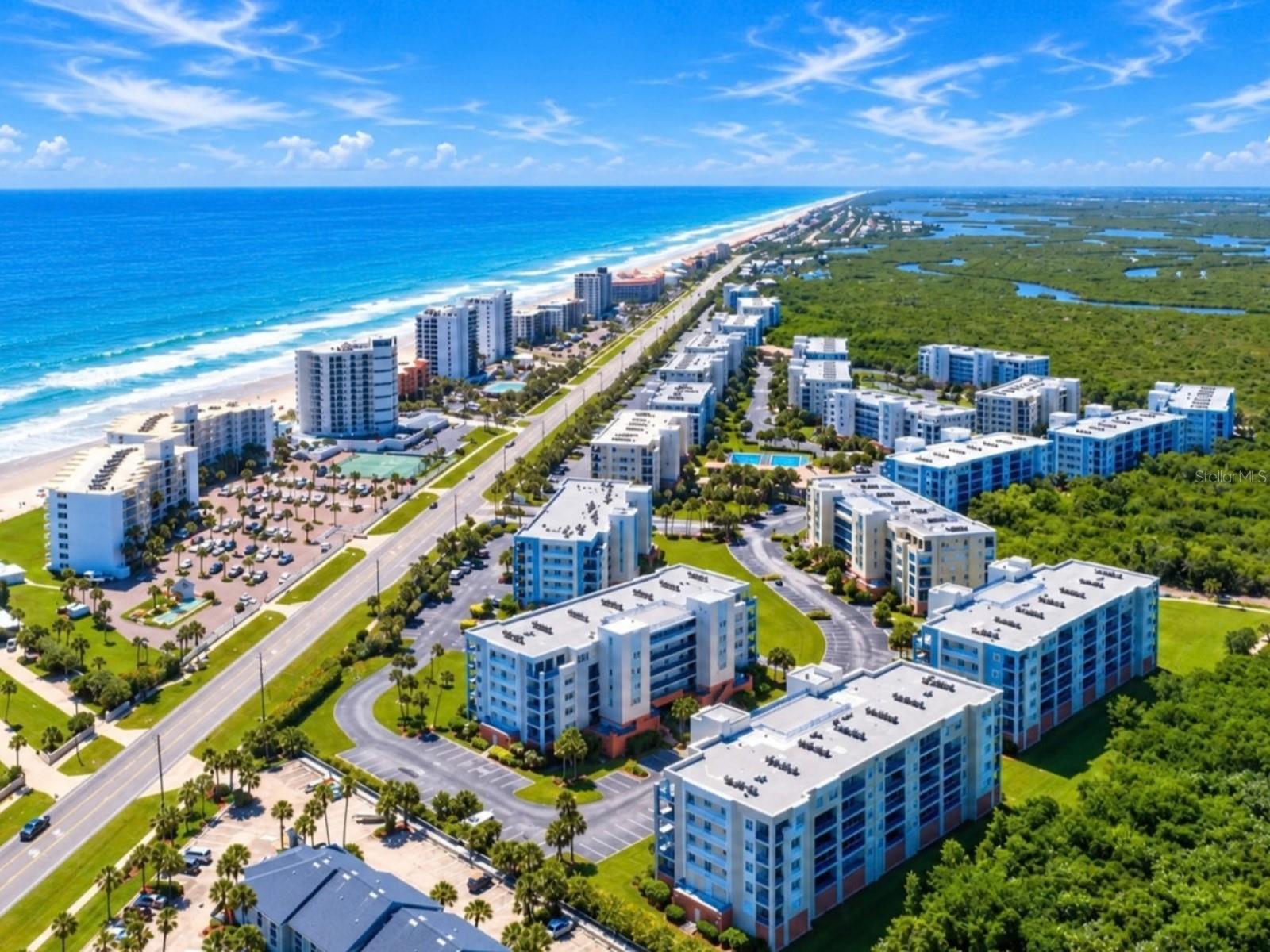 Virtually Staged. Welcome to Ocean Walk and this fully furnished third-floor 3-bedroom, 2-bath condominium offering 1,601 square feet of comfortable coastal living in one of New Smyrna Beach’s most amenity-rich gated communities. This home features a desirable split-bedroom floor plan with open living and dining spaces, a kitchen with generous cabinetry, ample workspace and convenient bar seating, and a spacious screened balcony overlooking Ocean Walk’s peaceful estuary and natural surroundings. The primary suite offers direct balcony access, a walk-in closet and a private bath with dual vanities, separate shower and jetted tub, while two additional bedrooms and a full guest bath provide plenty of room for family, guests or a home office. Step onto the screened balcony to enjoy beautiful estuary views, memorable Florida sunsets and coastal breezes, or explore the community’s winding nature boardwalk through the surrounding preserve. Ocean Walk offers an exceptional resort-style amenity package including two seasonally heated swimming pools and spas, two clubhouses, two fitness centers, saunas, tennis courts, pickleball courts, basketball, shuffleboard, bocce ball, BBQ and grilling areas, sun decks, a private movie theater, nature trails and estuary access for kayaking. Residents also enjoy dedicated private beach access leading to New Smyrna Beach’s highly desirable no-drive Atlantic shoreline. Building 7 is conveniently positioned within the community with easy access to the main clubhouse and pool area, and Ocean Walk also provides gated entry, elevators, covered and guest parking and beautifully maintained common areas. Association services include maintenance of the grounds and recreational amenities along with internet, basic cable, water, sewer, trash, pest control, security and building insurance. With a one-week minimum lease period, the property also offers attractive flexibility for owners considering seasonal or vacation-rental use. Whether enjoyed as a primary residence, second home or investment property, this property combines generous living space, peaceful estuary views, an outstanding amenity package and convenient access to the beach in a true New Smyrna Beach coastal setting.