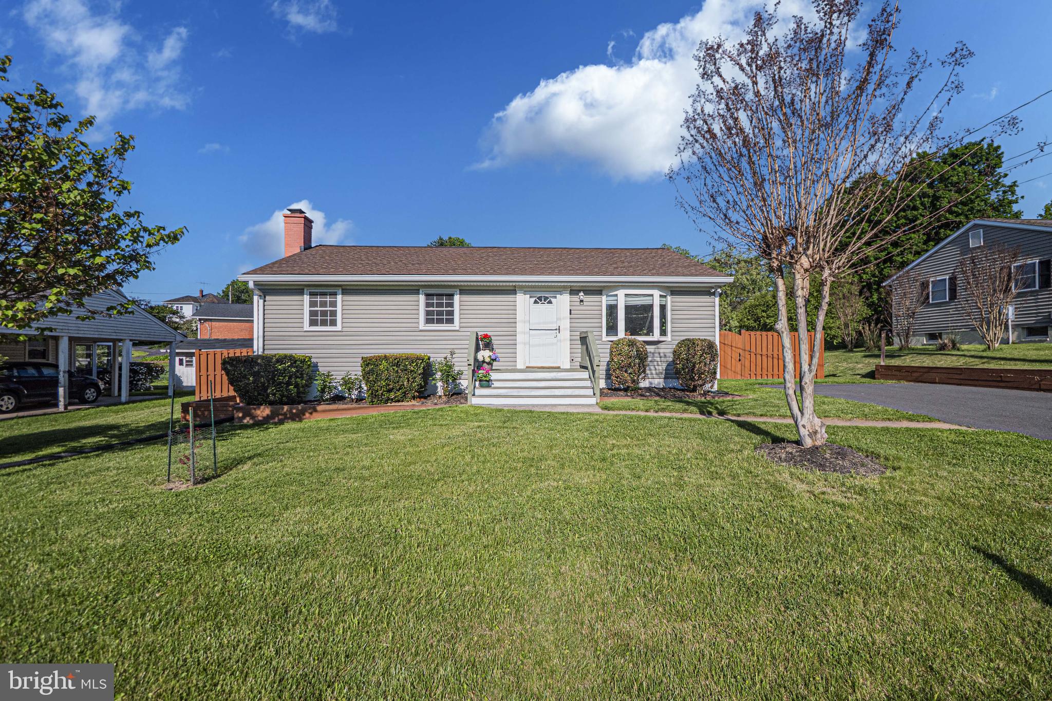 Beautiful 3BR/2.5BA Rancher in the Heart of Purcellville!Set on a picturesque lot with a flat, manicured front yard, this home welcomes you with lush green grass, mature trees, flowering plants, and a charming walkway leading to the front door. Step inside to a cozy family room featuring rich hardwood floors and a sun-filled bay window that fills the space with natural light.The eat-in kitchen showcases granite countertops, top-of-the-line appliances, durable laminate flooring, and direct access to the deck—perfect for entertaining or relaxing while overlooking the fully fenced backyard and newly built shed.The main level offers a spacious primary bedroom with peaceful backyard views and a private half bath, along with two additional well-sized bedrooms that share a modern hall bathroom with tiled flooring and a tub/shower combo.The fully finished lower level expands your living space with a large rec room anchored by a wood-burning fireplace with a brick mantle running the entire width of the room, two flexible bonus rooms ideal for bedrooms or home offices, a kitchenette, a laundry area, and a fully remodeled full bath featuring tiled floors, a dual-sink vanity with stone countertops, and a sleek frameless tiled shower. Located on a quiet no-outlett street with just a short walk to all the amenities downtown has to offer! Extra large driveway capable of holding four cars!!