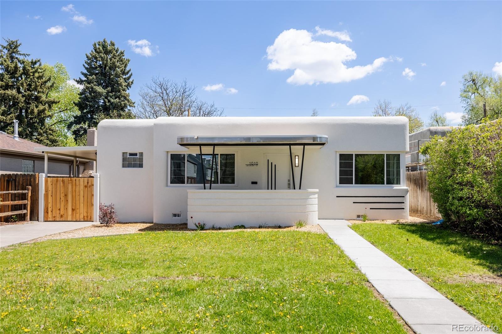 Welcome to this completely restored masterpiece of Streamline Moderne design—one of the last Art Deco homes built in
Denver. 
Attention was given to even the smallest details throughout the house, from the stepped baseboards to the handmade
light fixtures, to the tailor-made doors and streamline cabinet pulls. 
The kitchen is a vibrant work of art, where mint-green retro appliances and a dazzling backsplash create a perfect harmony of color and warmth. 
Both full bathrooms were painstakingly completed with intricate custom tile work, vintage vanity lights, and beautiful accompanying fixtures.
Throughout the home, you’ll find craftsmanship at every turn—stunning herringbone floors, elegant built-in shelving, glass
door handles, and other custom touches, in the Streamline Moderne motif.
Perfectly situated just one block from Mayfair Park, Padoca Bakery, and the charming Jersey St. Shoppette, this location offers both convenience and charm. 
With City Park, Cherry Creek, and the Denver Botanic Gardens just minutes away, this impeccably restored Art Deco treasure is a
rare find. Don’t miss your chance to own a true architectural jewel, where vintage style meets modern refinement.

Speak with our preferred lender for up to $10K of lender credits to put towards closing costs or a rate buydown.