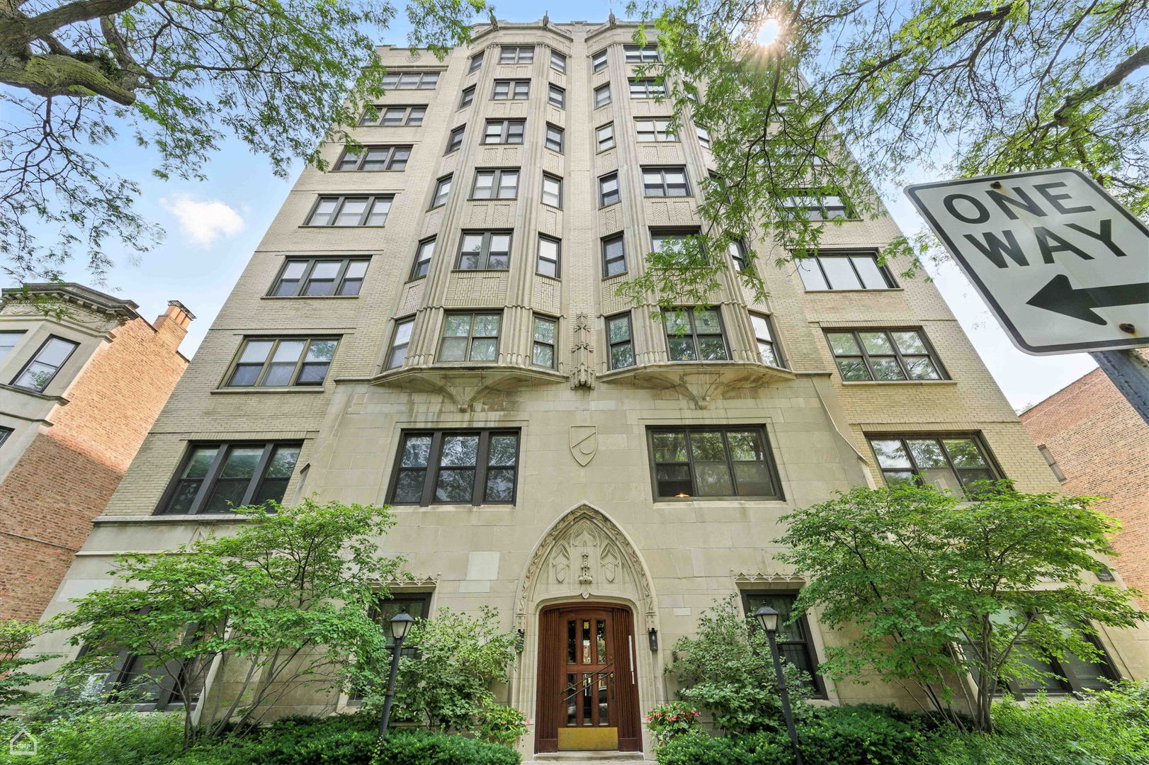 Best University of Chicago location, just steps from the main campus as well as both Laboratory School locations. This bright and spacious four-bedroom, three-full-bath co-op apartment is perched on the 6th floor of an elegant vintage mid-rise elevator building of only 14 units. Unobstructed views from every window offer lovely vistas of the University campus towers and surrounding neighborhood. This charming apartment has a fully updated kitchen, central a/c and in-unit laundry. Dedicated parking spot in the adjacent lot is available for an additional $90/month. The building has a lovely backyard for playing, gardening, and grilling. Well-managed association, including an on-site building engineer.  Note that the monthly HOA includes property taxes.