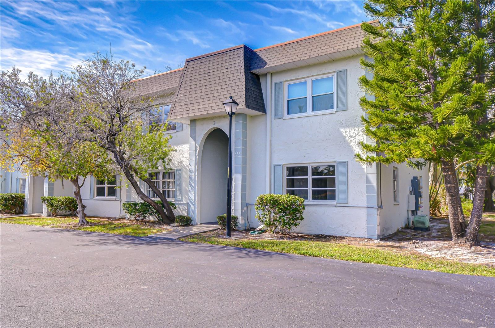 Welcome home and start enjoying the Florida lifestyle in this charming 1-bedroom, 1-bathroom ground-floor condo located in the highly sought-after community of Tradewinds! This inviting unit features an open-concept kitchen and living area, creating a bright and comfortable space perfect for everyday living and entertaining. Step outside to your screened-in rear porch, an ideal spot to enjoy morning coffee or unwind in the evening breeze. Additional features include on-site laundry facilities, no stairs to climb, and a 30-day minimum lease period. No pets permitted.  Residents enjoy access to a solar-heated community pool and clubhouse, adding to the relaxed resort-style atmosphere. Conveniently located with entrances from both McMullen Booth Road and Bayshore Boulevard, Tradewinds offers easy access to Clearwater Beach, downtown Safety Harbor, the Courtney Campbell Causeway, Tampa, and St. Petersburg. Both Tampa International Airport (TPA) and St. Pete-Clearwater International Airport (PIE) are just a short drive away. Enjoy nearby shopping, grocery stores, restaurants, hospitals, sports venues, entertainment, and Florida’s beautiful Gulf beaches.  Schedule your showing today!