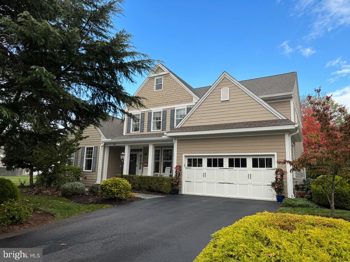 Experience the ultimate blend of town and country living in this exceptional, semi-custom-built TAG home, perfectly situated in one of Malvern’s most coveted areas with a private cul de sac lot. Radiating timeless curb appeal with its charmed covered slate front porch, low-maintenance fiber cement siding, and brand-new roof, this residence is masterfully designed to cater to both growing families seeking the award-winning Great Valley School District and downsizers desiring effortless main-level living. Step inside to an elegant interior defined by gleaming hardwood floors, upgraded crown moldings, and sophisticated trim work that seamlessly transitions from formal entertaining to casual relaxation. Host unforgettable dinner parties in the formal dining room with elegant tray ceiling, or unwind in the warm, peaceful, and inviting living room—a versatile space that also serves as the perfect, quiet home office. The heart of the home features a spectacular two-story family room with a cozy wood-burning fireplace (easily convertible to gas), opening beautifully into a sunlit morning room and a chef’s dream gourmet kitchen equipped with 42" Century cabinets, premium granite countertops, stainless steel appliances, a large central island, a five-burner gas stove, and a double wall oven plus a walk-in pantry. Just off the kitchen, daily organization is made effortless by a highly functional mudroom and laundry room area, complete with a built-in desk area that is perfect for household management or a secondary workstation. Retreat to the luxurious first-floor primary suite, boasting dual-vanities , dual walk-in closets, a stall shower, and a heated Jacuzzi tub, while the second level offers incredible flexibility with a second spacious master suite alongside two additional bedrooms sharing a Jack-and-Jill bath. The entertainment possibilities extend to the expansive finished basement, a true destination featuring a custom wet bar, a media area with a projector setup, a workout area, a full bath, and a massive unfinished space perfect for a ping-pong room and seasonal storage. Outside, your private oasis awaits with a flat, beautifully manicured backyard framed by mature trees, where clever lot positioning shields you from facing neighbors, and a large rear patio with an added paver sidewalk leading directly to the mudroom makes hosting summer BBQs a breeze. Best of all, this tranquil retreat offers unmatched everyday convenience, allowing you to easily walk to downtown Malvern's vibrant shops, local dining, and the Malvern SEPTA Train Station for a hassle-free commute straight into the city.