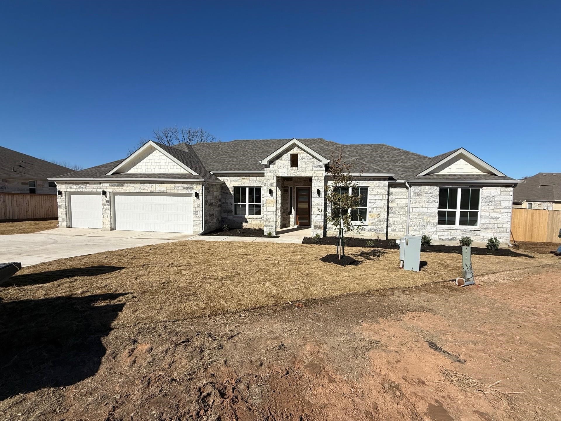 Completion scheduled by end of year 2025.  Currently in the sheet rock stage.  New home in gated guarded golf course community with access to Lake Marble Falls through property owners park.  Home features 3 bedrooms, 2 1/2 baths, study, open concept living area, large dining area plus an oversized 3 car garage.  Electric fireplace in living area. Island kitchen, quartz counters in kitchen and baths, LVP flooring throughout with exception of baths.  Separate tub and shower in primary bath.  Excellent cul-de-sac location.  Meadowlakes offers an 18 hole golf course, community pool, tennis courts/pickle ball courts, multiple parks, restaurant, driving range and waterfront POA park with boat launch and day dock/fishing pier.