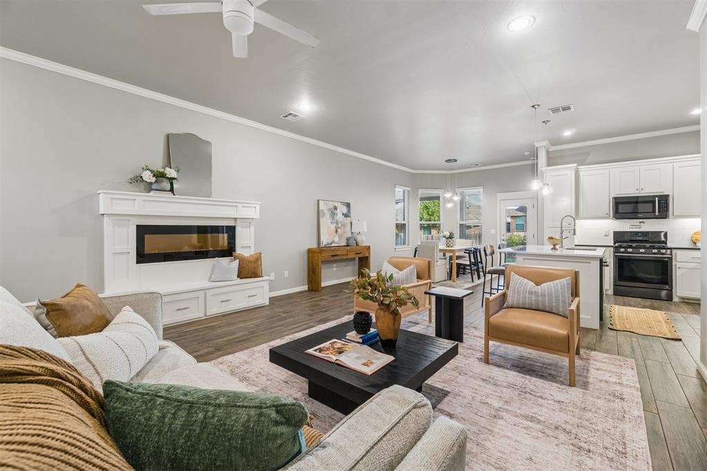Best price point in Stonebriar! 3 BEDS/2.5 BATHS/DEDICATED OFFICE/3 CAR TANDEM GARAGE/2185 SQFT/EDMOND SCHOOLS! Amazing opportunity to get into this beautifully maintained 3-bed, 2.5-bath home that has it all: dedicated study, split floor plan, 3-car tandem garage, cohesive wood look tile throughout all living areas and hallways, new carpet(2024) in all bedrooms, outdoor living space with motorized sunscreens, neighborhood pool, and the best location close to Mitch Park, YMCA, schools, shopping, and everything Edmond has to offer. Large covered front porch welcomes you home, and step into the foyer area that opens to spacious living room featuring a cozy fireplace, perfect for relaxing or entertaining. The kitchen is a chef's delight with a center island featuring new quartzite countertops (2025) and bar seating, under-cabinet lighting, a pot filler, new sink and dishwasher (2025), and adjoining dining area which provides plenty of space for large family meals and entertaining many guests. Cute guest bath and a drop zone with hooks and a bench make living here so easy. Retreat to the primary suite featuring soothing colors and a spa-inspired bath with double sinks, a seated vanity area, Whirlpool tub, walk-in shower, plenty of storage, and an impressive walk-in closet with a built-in dresser, three levels of hanging space, and direct access to the laundry room. The laundry room offers generous storage, built in drying rack, and sink. Two spacious secondary bedrooms share a Jack-and-Jill bath, each with its own private vanity and sink. Outdoor living is easy with this large covered back patio featuring remote-controlled sun/privacy screens. Additional updates include a new water softener and water heater (2025). A sprinkler system keeps the lawn looking great. Stonebriar residents enjoy neighborhood pool, clubhouse, playground, fishing pond, greenspaces, and walking trails.