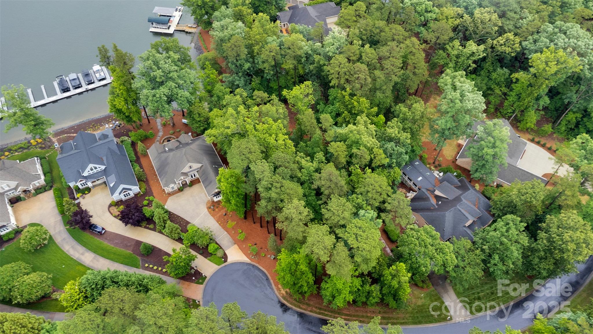 Waterfront lot on Badin Lake! This beautiful 0.44-acre lakefront property is located in the prestigious, gated Patterson’s Bridge neighborhood within the Old North State Club at Uwharrie Point. This lot offers stunning Badin Lake views and is perfect for building your dream lake home. Enjoy resort-style living with access to the private Old North State Club, featuring a top-ranked Tom Fazio-designed championship golf course with 8 of the 18 holes along the water. More club amenities include a full-service marina, fine and casual dining, tennis courts, pickleball, two pools, a fitness center, walking trails, and an 8-room lodge for guests. 1/3 of Badin Lake's shoreline is protected as National Forest, so the area is uncrowded & peaceful. Just an hour from Charlotte, Winston-Salem, & Greensboro, this location offers both tranquility & convenience. Don't miss this rare opportunity to build in a vibrant premier lakefront community with unmatched recreational & lifestyle amenities.