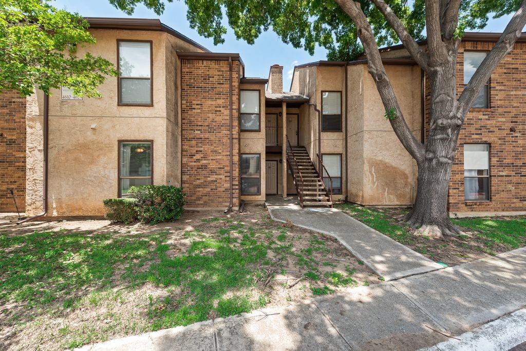 Fantastic opportunity for a first  time homebuyer, investor, or anyone looking to add their personal touch! This 2 bedroom, 1 bath condo offers a functional floor plan with a spacious living area, dedicated dining space, and a well-appointed kitchen with ample cabinet and counter space.The inviting living room features a cozy fireplace and provides direct access to a private covered backyard patio, creating the perfect space for morning coffee, outdoor relaxation, or entertaining guests. The generously sized primary bedroom includes a large walk-in closet, while the secondary bedroom offers flexibility for guests, a home office, or additional living needs.Enjoy low-maintenance living with an HOA that covers water, roof maintenance, foundation, and fence repairs, helping provide peace of mind and predictable ownership costs. Residents also have access to desirable community amenities including a swimming pool, tennis courts, and fitness center.Additional highlights include two designated parking spaces, mature landscaping, and a convenient location near shopping, dining, major highways, and everyday conveniences.Whether you're searching for your first home, a rental property, or a value-add investment opportunity, this property offers exceptional potential and affordability in a well established community.