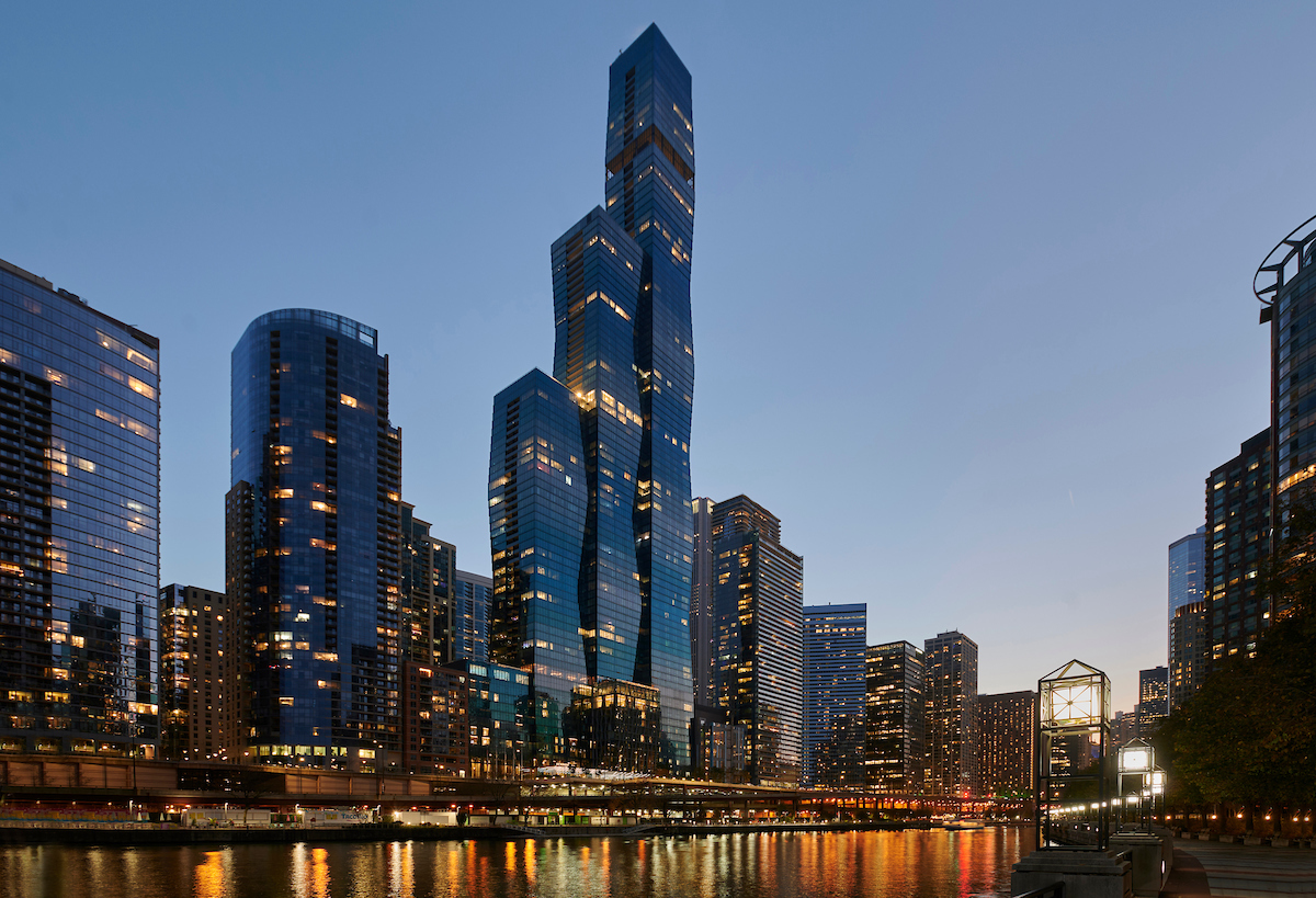 Experience refined luxury living at The Residences at The St. Regis Chicago-an architectural masterpiece soaring 101 stories above the city in the coveted Lakeshore East neighborhood. Designed by world-renowned architect Jeanne Gang of Studio Gang, with interiors by Hirsch Bedner Associates, this crystalline tower is the crown jewel of Chicago's skyline, offering an unmatched blend of location, lifestyle, and sophistication. This high-floor residence features a well-designed split two-bedroom layout with 2.5 baths. A spacious private foyer with a generous coat closet sets the tone for what lies beyond-gracious, light-filled interiors, elevated finishes, and expansive views that define the St. Regis experience. The open-concept great room is framed by floor-to-ceiling windows, revealing sweeping south-facing vistas of the city, Lake Michigan, Millennium and Grant Parks, Buckingham Fountain, and Museum Campus. Wide-plank hardwood flooring and thoughtfully curated design elements enhance the space, while the adjacent chef's kitchen impresses with modern Snaidero cabinetry, a Quartz waterfall island, and top-of-the-line Gaggenau and Thermador appliances. The primary suite is a private sanctuary tucked away in its own wing, complete with breathtaking views, a custom walk-in closet, and a spa-caliber five-fixture bath. The second bedroom offers privacy and comfort with its own en-suite bath, while a stylish powder room and in-unit laundry add convenience. Life at The St. Regis extends far beyond your residence. Revel in a world of unparalleled amenities: unwind by the outdoor pool and hot tub with panoramic views, perfect your swing at the golf simulator, or host soirees in the private dining room. From the sky lounge to the children's activity space, every detail has been curated to elevate your lifestyle. Indulge in a cinema, wine vault, fitness center with steam and sauna rooms, Tesla cars on demand, and even a luxurious dog lounge with an indoor run. For ultimate convenience, residents enjoy direct access to the 5-star hotel amenities, including a state-of-the-art fitness center, rejuvenating spa, indoor pool, and exceptional dining options. Situated at the confluence of the Chicago River and Lake Michigan, this prestigious location places the city's finest attractions at your doorstep. Stroll along the lakefront, explore world-class museums and galleries, shop the Magnificent Mile, and lose yourself in the beauty of Chicago's vibrant parks and cultural landmarks. The St. Regis Chicago redefines city living with an unmatched combination of luxury, artistry, and location. Welcome to a life without compromise-where every moment is extraordinary.
