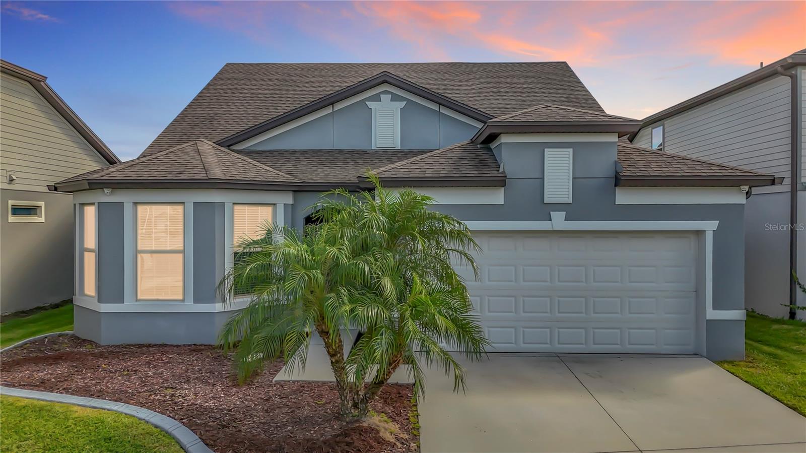 Welcome to your dream home in the gated community of Epperson Ranch in Wesley Chapel, Florida! This stunning 4-bedroom, 3-bathroom home with a dedicated office combines modern design, energy efficiency, and resort-style living. Step inside to discover an open and airy floor plan featuring vinyl wood flooring throughout the main living areas and plush gray carpet in the bedrooms. The bright living room boasts stackable sliding glass doors that open to a large screened-in patio, perfect for relaxing or entertaining in Florida’s beautiful weather. The gourmet kitchen showcases stainless steel appliances, granite countertops, elegant wood cabinetry, and a spacious island with seating—ideal for family gatherings and hosting friends. A formal dining room adds a touch of sophistication for special occasions. The first-floor primary suite offers a peaceful retreat with dual sinks, a walk-in shower, and a spacious walk-in closet. Two additional bedrooms, a full bathroom, and a private office complete the first floor. Upstairs, a generous loft area—currently a game room—can easily be used as a home theater, playroom, or secondary living space. The fourth bedroom and third full bath upstairs provide privacy for guests or family. Enjoy modern upgrades including a Yamaha surround sound system, dual HVAC systems, solar panels, and a security system for comfort, efficiency, and peace of mind. Living in Epperson Ranch means access to world-class amenities, including the famous Metro Lagoon, eco-friendly street lighting, Eagle Park with walking trails and picnic areas, the Lake House with a fitness center and event spaces, a dog park, butterfly garden, tot lot, and golf cart paths. The HOA includes cable and ultra-high-speed internet, offering even more value. Conveniently located near downtown Tampa, Gulf beaches, and major highways, this home provides the perfect balance of luxury, comfort, and community. Don’t miss your opportunity to make this incredible home yours—schedule your private showing today!