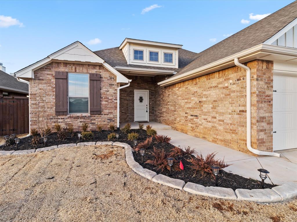 Welcome to 4213 NW 158th St, a beautifully designed home located in the highly desirable Deer Creek School District. This inviting property offers a perfect blend of comfort, style, and functionality.Inside, you'll find a spacious layout featuring 4 bedrooms, 2 full bathrooms, and a convenient utility room. The open-concept living area is ideal for both everyday living and entertaining, highlighted by a cozy fireplace, abundant natural light, and durable wood-look flooring.The kitchen is thoughtfully designed with modern finishes, including granite countertops, stainless steel appliances, a decorative tile backsplash, a walk-in pantry, and a large island that provides additional prep space and seating.The primary suite offers a relaxing retreat with a beautifully appointed en-suite bathroom featuring dual sinks, a soaking tub, a separate walk-in shower, and a generous walk-in closet.Step outside to enjoy the covered patio space perfect for entertaining or unwinding complete with a fireplace, gas line, and TV hookup for year-round enjoyment.Additional features include a three-car garage with a storm shelter, a tankless water heater, and energy-efficient upgrades throughout.Conveniently located near shopping, dining, and major roadways, this home offers both comfort and accessibility. Don't miss the opportunity to make this exceptional property your next home!LEASE ONLYTenant is responsible for all utilities as well as maintaining the lawn. One year minimum lease.