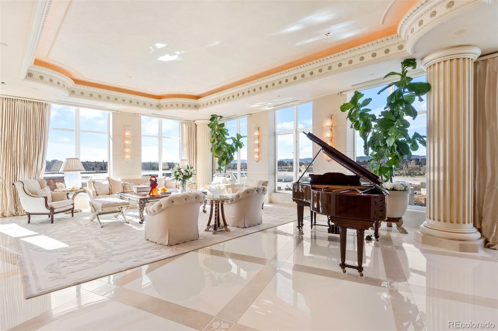 Expertly envisioned and curated, this extraordinary penthouse is a masterclass in design, craftsmanship, and timeless European elegance. Rich mahogany walls, bespoke millwork, and 10-foot doors create a striking sense of arrival, while tailored materials and soft ambient lighting establish an atmosphere that is both grand and intimately refined. Perched in the heart of Cherry Creek, the residence pairs a sophisticated European aesthetic with a floor plan designed for elevated entertaining and effortless daily living. Expansive living spaces unfold beneath soaring ceilings and walls of glass, capturing natural light and framing breathtaking mountain views over the iconic Denver Country Club golf course. A formal dining room graciously accommodates 30+ guests, complemented by a richly appointed mahogany study and two beautifully finished en-suite guest rooms. The primary suite is a private sanctuary, featuring an expansive bedroom, dual custom closets designed to impress the most discerning buyer, and an elegant, spa-inspired bath that evokes a five-star retreat. A remarkable 1,230 square foot terrace extends the living experience outdoors, offering an extraordinary setting for elegant gatherings or quiet evenings immersed in panoramic city lights and Colorado sunsets. Spanning over 7,100 finished square feet, the residence also includes four dedicated parking spaces. At NorthCreek, residents enjoy a level of privacy, security, and service reserved for the world’s finest addresses, with dedicated concierge, valet, and porter services. All just moments from the acclaimed dining, luxury boutiques, and renowned galleries of Cherry Creek North.