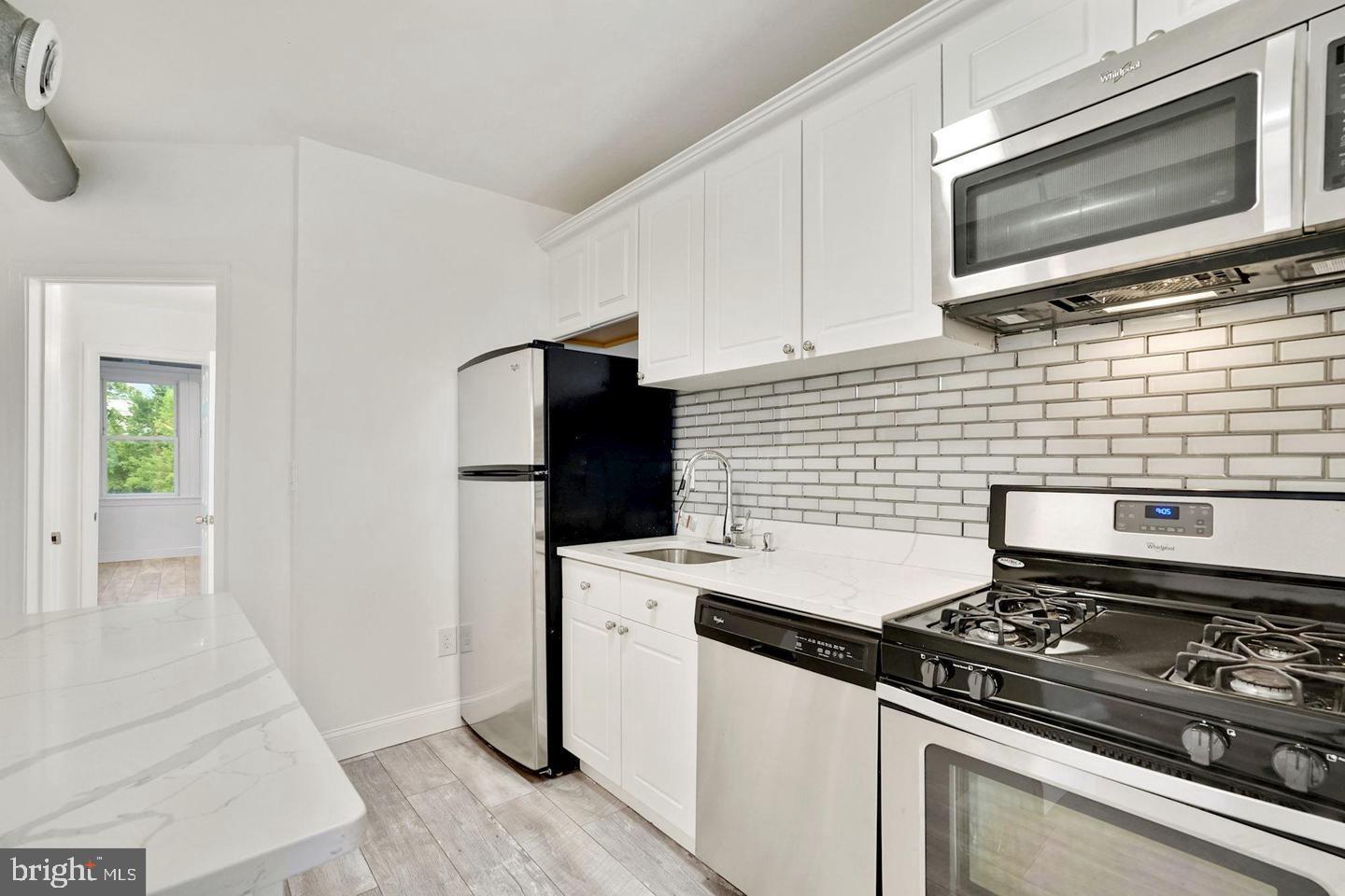 Amazing rental in the heart of Brightwood Park! Fully renovated, Contemporary, bright, and sleek, describes this large, 2b/2b condo, in the growing Georgia Avenue Corridor. Huge Living Room with a deluxe kitchen with Island. The following are some of the highlights of the subject property: Huge living room, dining room, kitchen combo, deluxe custom kitchen with gas stove, washer/dryer combo, stainless steel appliances, custom bathrooms, Walk in closet, Central AC and No Condo Fee! Short distance to Rock Creek Park, restaurants, multiple Metro and bus stops. Both the Petworth and Columbia Heights neighborhoods are within walking distance.Tenant will be responsible for a monthly utility.