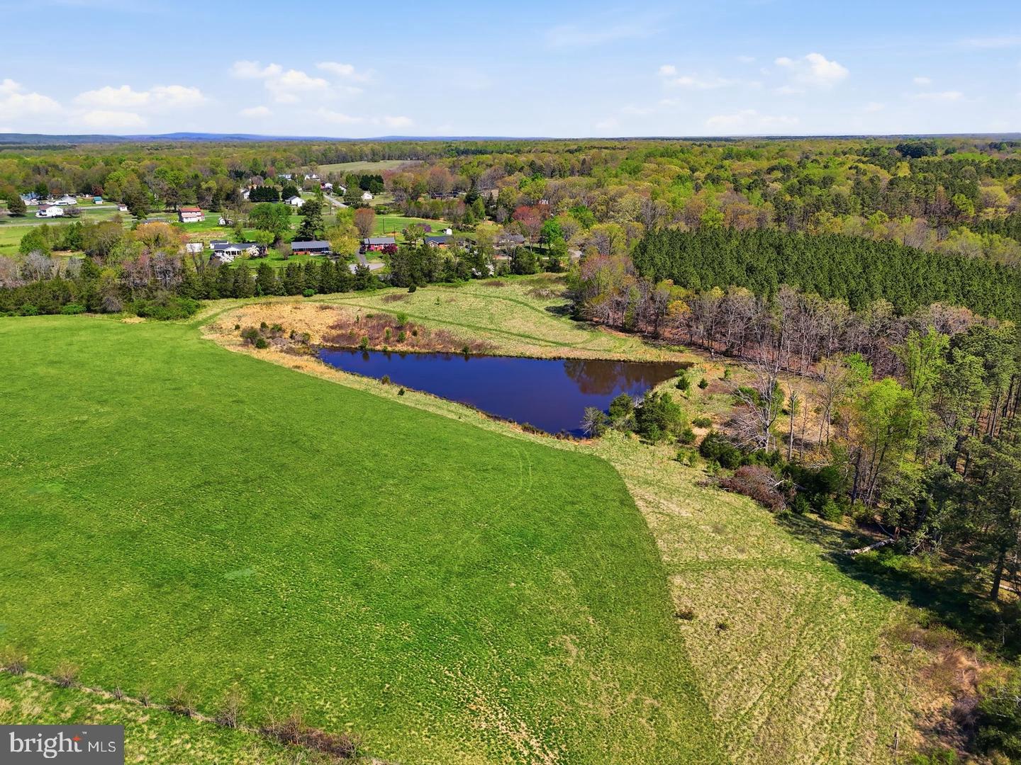 EXCEPTIONAL INVESTMENT & DEVELOPMENT OPPORTUNITY IN ORANGE COUNTY! Here is your chance to secure approximately 64.32 acres comprised of SIX adjoining parcels, each with its own tax map number, all being offered together for one price! With extensive frontage along Route 20, this property offers outstanding visibility, accessibility, flexibility and tremendous future potential.The VALUE IS IN THE LAND and the possibilities it presents. The current owner has already completed a scope of work plan for a proposed 23-lot subdivision, giving a future owner an excellent starting point for exploring residential development. Develop now or hold for the future—the six separate parcels and substantial acreage create numerous possibilities. Consider a residential subdivision, private estate, family compound, multi-generational property, equestrian use, farm, investment holding, or other uses permitted by Orange County.Adding immediate value is an existing classic all-brick Cape Cod home, along with a barn/stable and board-fenced acreage. The home is currently tenant occupied and generating $2,500 per month in rental income, providing income while a buyer evaluates future plans. The tenant would prefer to remain for approximately another 1.5 years, if possible.Opportunities offering this combination of acreage, multiple adjoining parcels, Route 20 frontage, existing improvements, current rental income and potential future development don't come along every day. Whether you're a developer, investor or buyer looking to create a one-of-a-kind family property, this offering deserves a closer look.SIX PARCELS. 64+ ACRES. EXISTING INCOME. DEVELOPMENT POTENTIAL. ONE PRICE. Buy it, use it, develop it, or hold it for the future—the opportunity is here!