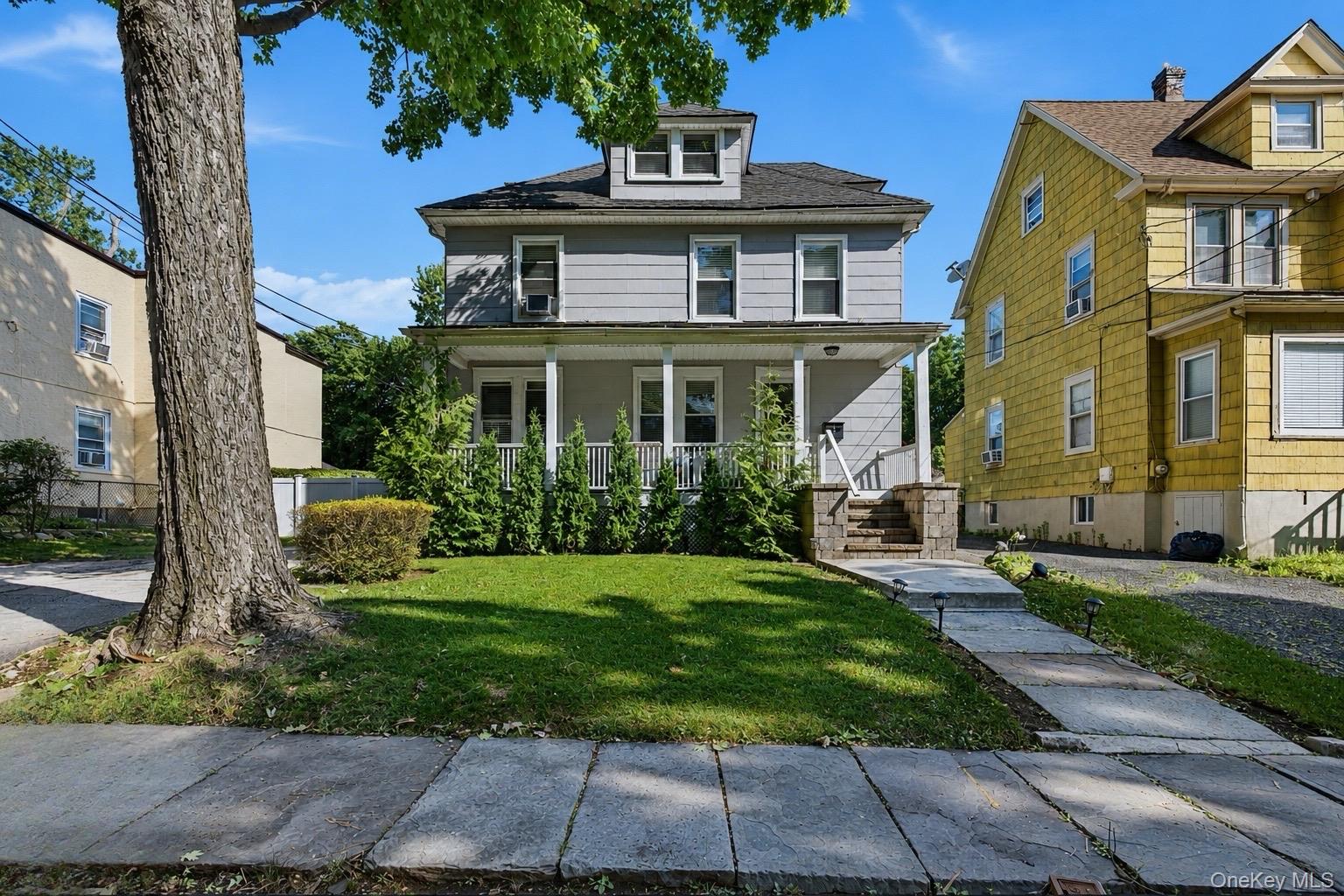 Welcome to 29 Saint Joseph Street, New Rochelle — a beautifully maintained and spacious home nestled on a quiet dead-end street. Situated on an oversized double lot in a two-family zone, this property offers space, flexibility, and endless potential.Inside, enjoy a sun-filled layout featuring hardwood floors throughout, a spacious living room, formal dining room, and an eat-in kitchen perfect for everyday living and entertaining.The second floor offers four generously sized bedrooms, while the fully finished attic provides bonus space for a home office, gym, guest suite, or playroom. A walk-out partially finished basement adds even more versatility.Step outside to a private fenced backyard ideal for entertaining, featuring an above-ground pool sitting beautifully on a lush green lawn, an enormous driveway that comfortably fits four cars, an oversized three-car garage, and a charming front porch perfect for relaxing.Conveniently located minutes from major highways, shopping, dining, and the New Rochelle Metro-North Station with direct access to Grand Central in approximately 30–40 minutes. Enjoy nearby waterfront destinations including Glen Island Park, offering scenic views, walking paths, beaches, and vibrant outdoor recreation. Residents also benefit from easy access to renowned Michelin-star dining throughout Westchester and nearby Manhattan.Move-in ready and perfectly located — don’t miss this exceptional opportunity in the heart of New Rochelle!Note: Eligible for STAR program (New York State tax benefit that reduces the school tax portion of property taxes for eligible homeowners who use the home as their primary residence).  Contact the Assessor’s Office to file a tax grievance.