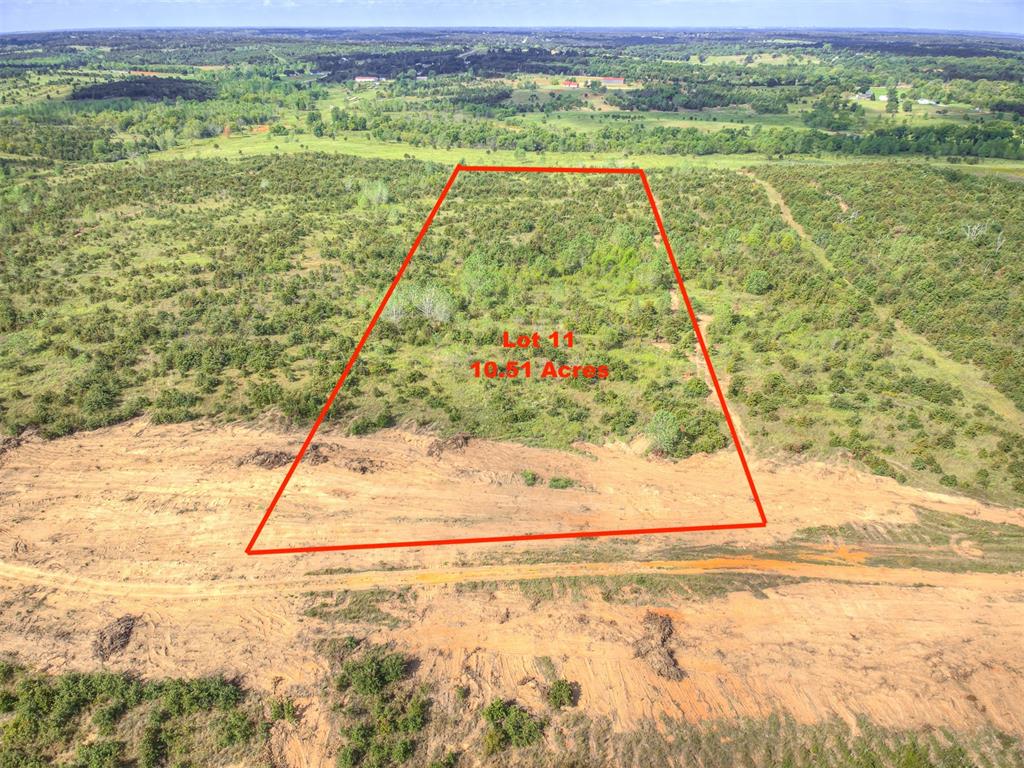 Welcome to Ridgeline Estates! Norman's newest private upscale development in East Norman at 140th and Cedar Lane Rd. Each of these 28 lots ranging in size from 10 to 20 acres have incredible character with gently rolling hills, oak and pecan trees. This lot has 10.51 acres.  The property has a gentle slope from Baxter Lane to the west end of the lot creating exceptional views.  Evenings watching sunsets and the abundant local wildlife will make lasting memories at each of these wonderful homesites. This private development won't have streets completed until December, but we are making lots available now. OEC will bring electric up all the streets at no charge and provide High Speed Fiber internet. Come take a tour and pick out your future homesite. Horses allowed. Lot prices ranging from $12,500 to $20,000 an acre.