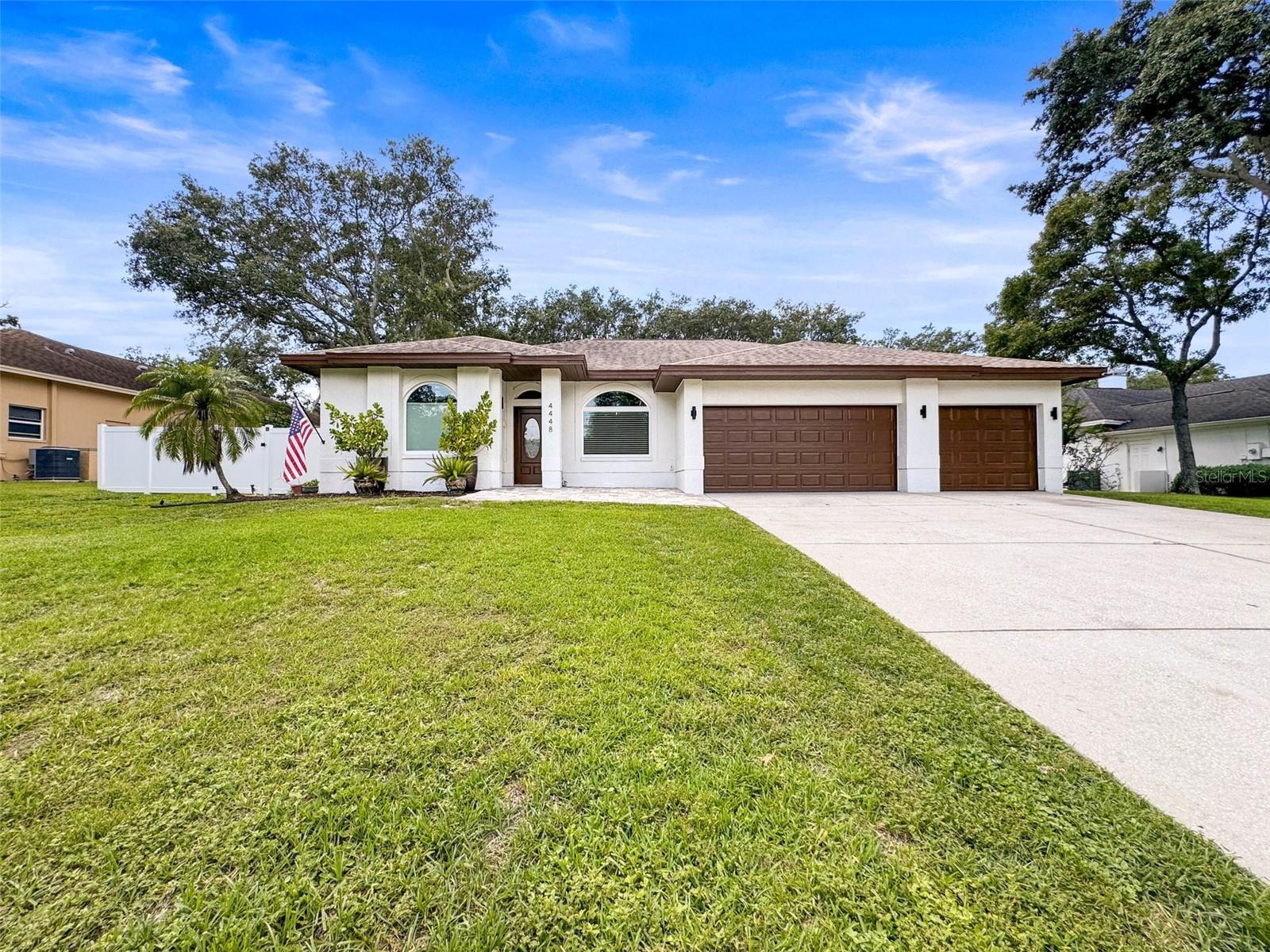 Welcome to your Glenbrook Estates dream home located right in the heart of Palm Harbor, Florida! This stunning property offers the perfect blend of luxury, comfort, and convenience, making it an ideal choice for those seeking a spacious and stylish residence. As you step inside, you'll be immediately captivated by the soaring 15-foot ceilings in the main living areas, creating an atmosphere of grandeur and openness. The newly installed luxury vinyl plank flooring throughout the house adds a touch of elegance and practicality, ensuring easy maintenance and long-lasting beauty. This impressive home boasts five generously sized bedrooms and three well-appointed bathrooms, providing ample space for your family and guests. The primary bedroom is a true retreat, offering a serene space to unwind after a long day, dual sink vanity, a soaking tub, and a step-in tiled shower. For those who work from home or need extra space, there's an additional large versatile bonus room that can easily serve as a sixth bedroom or a dedicated home office. The heart of this home is undoubtedly the fully renovated kitchen, which is sure to impress even the most discerning chef. Featuring sleek quartz countertops and high-end stainless steel appliances, this culinary haven is perfect for preparing gourmet meals or casual family dinners. Adjacent to the kitchen, you'll find a huge butler's pantry, providing additional storage and workspace for all your entertaining needs. You’ll also find for those chilly Florida evenings a cozy wood-burning fireplace just off the kitchen/dining area. For those who love to entertain or simply relax, the upstairs game room is a true showstopper. Complete with a bar and sink, this expansive space is perfect for hosting game nights, watching sports, or simply unwinding with friends and family. It's the ultimate "man cave" or entertainment area that will quickly become everyone's favorite hangout spot. Step outside, and you'll discover a backyard oasis that's perfect for Florida living. The large 0.39-acre lot provides plenty of space for outdoor activities, while the heated saltwater pool offers a refreshing escape from the warm Florida sun. Most updates to the property done 2022-2024 ensure that you can move in with peace of mind. The roof was recently replaced , new pool heater/saltwater pump system, and the home features a new smart water heater and a newer air conditioning system. A new PVC fence provides privacy and security, while the freshly painted exterior and interior give the home a crisp, clean look. All lighting, ceiling fans, outlets, thermostats, and switches have been updated with smart technology. Oversized 3 car garage the perfect spot to keep your cars protected from the elements or set up a workshop for your hobbies. Location is key, and this property doesn't disappoint. Situated just minutes from downtown Palm Harbor, Dunedin, and Tarpon Springs you'll have easy access to shopping, dining, and entertainment options. This home is also just a short walk to Innisbrook golf course. For beach lovers, the pristine shores of Honeymoon Island are just a short drive away, providing the perfect backdrop for weekend getaways or daily sunset strolls. This Palm Harbor gem truly has it all. Whether you're raising a family, working from home, or simply looking for a place to relax and entertain, this house checks all the boxes. Schedule a viewing today and prepare to fall in love with your future paradise in Palm Harbor!