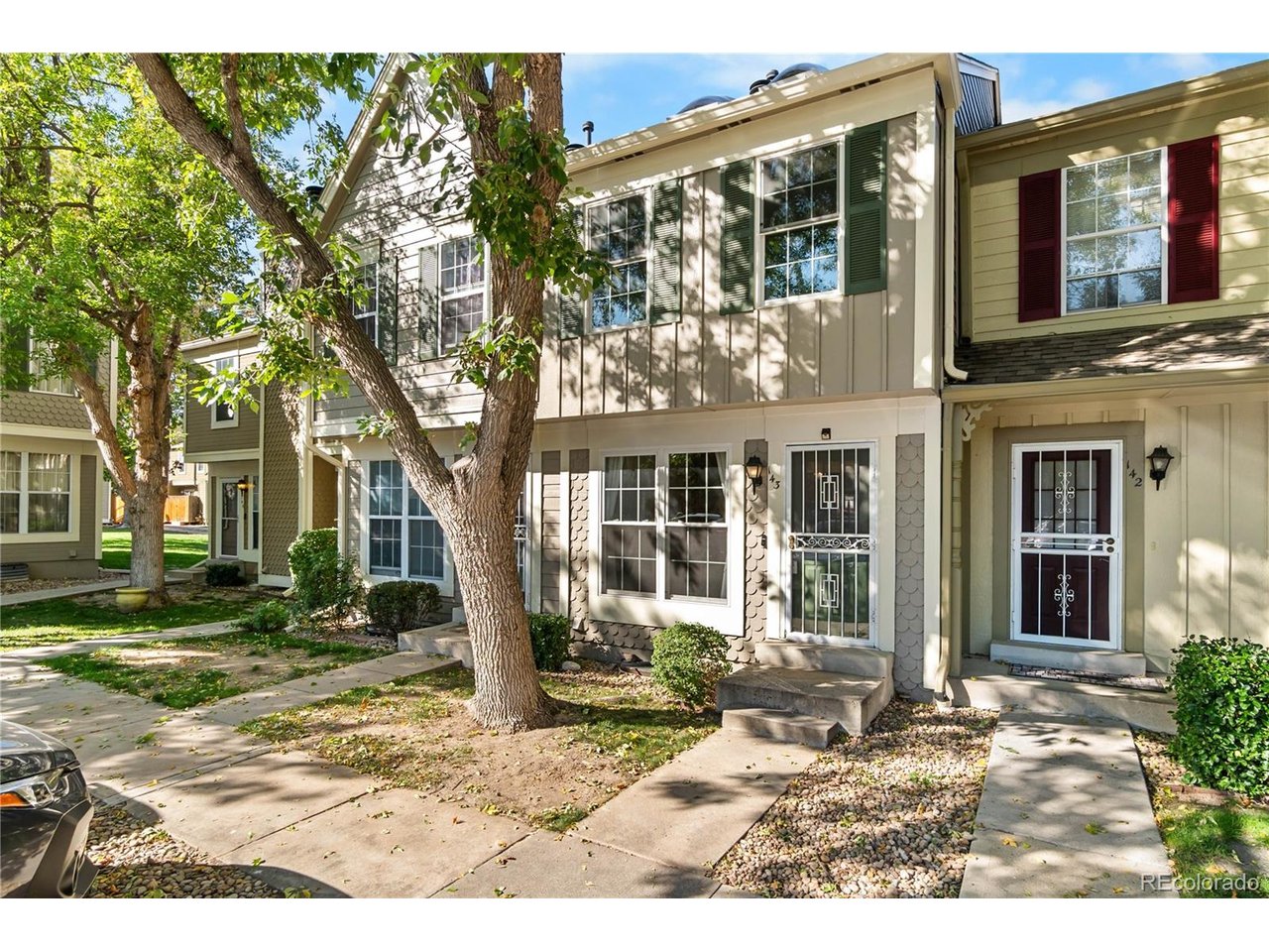 Finally a place of your very own! This recently refreshed 2 bedroom, 1.5 bath townhouse offers the perfect blend of quiet, easy living and unbeatable location. Pull in to your private parking spot, just steps from the front door, and walk in to the welcoming living room with easy clean laminate flooring throughout the main level and a cozy wood burning fireplace, perfect for unwinding. Yes, there's even space for a dedicated Dining Table AND causal barstools, perfect to chat during cooking & dinner prep without being in the way. With an updated upstairs bathroom, newer windows, newer Zoned HVAC with humidifier, freshly painted interior throughout, AND brand-new skylights (one of only a few units in the complex with them), it really is Move-In Ready. That's over $30k in recent updates and investments in the home! Need extra space? The 500+ sqft unfinished basement provides flexible possibilities for a home gym, workshop, hobby space, or abundant storage.Enjoy true lock-and-leave convenience with a maintenance-free lifestyle. Your private patio with composite decking and dedicated exterior storage offers a quiet spot for morning coffee, while the HOA takes care of exterior maintenance and roof, plus water, sewer, snow removal, trash and access to a private community pool.Situated in a prime Denver-metro location, outdoor adventures are right at your doorstep with nearby access to both the High Line Canal Trail and Cherry Creek Trail. Savor the incredible dining and shopping variety along Havana Street and Hampden Avenue, or hop on nearby transit or trail paths to reach Cherry Creek Mall, Wash Park, the DU area, CU & Anschutz Medial Complex, Downtown Denver, or RTD Straight to DIA. Commuting is a breeze with quick routes via Parker/Leetsdale and fast access to I25 and 225. Just the spot for low-maintenance comfort plus close to everything the city has to offer. Can't visit in person? Check out the 3D Tour, more photos, and all the info at www.1811SQuebecWay143.com