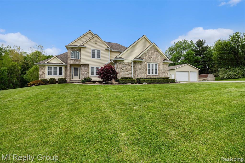 Discover this beautifully maintained home featuring 5 bedrooms, 2 full and 2 half baths, offering comfort, style, and functionality * The great room welcomes you with bright, airy space, while the formal dining room is perfect for gatherings * A modern kitchen with sleek black stainless steel appliances and a pantry ensures effortless meal prep * The first-floor primary suite boasts a full ensuite with a Euro shower, while upstairs, 3 large bedrooms with extra-large closets share a full bath. A fully finished walkout basement adds incredible space, complete with a wet bar, pool table, living area, half bath, and 5th bedroom—ideal for entertaining or working from home * Step outside to enjoy stunning tree-lined views and a peaceful pond, where wildlife thrives. A 2-car attached garage provides ample storage, and for additional space, a 30x52 heated pole barn with electricity and a cement floor is perfect for a workshop or hobby space * Recent Updates: Newer roof, windows, siding, gutter guards, high-efficiency Lennox furnace & A/C * Don’t miss this exceptional opportunity—schedule a showing today!