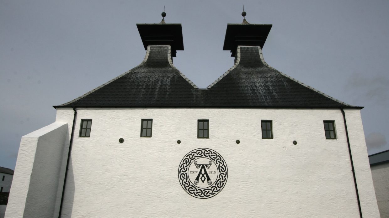 Ardbeg distillery with symbol and twin pagodas