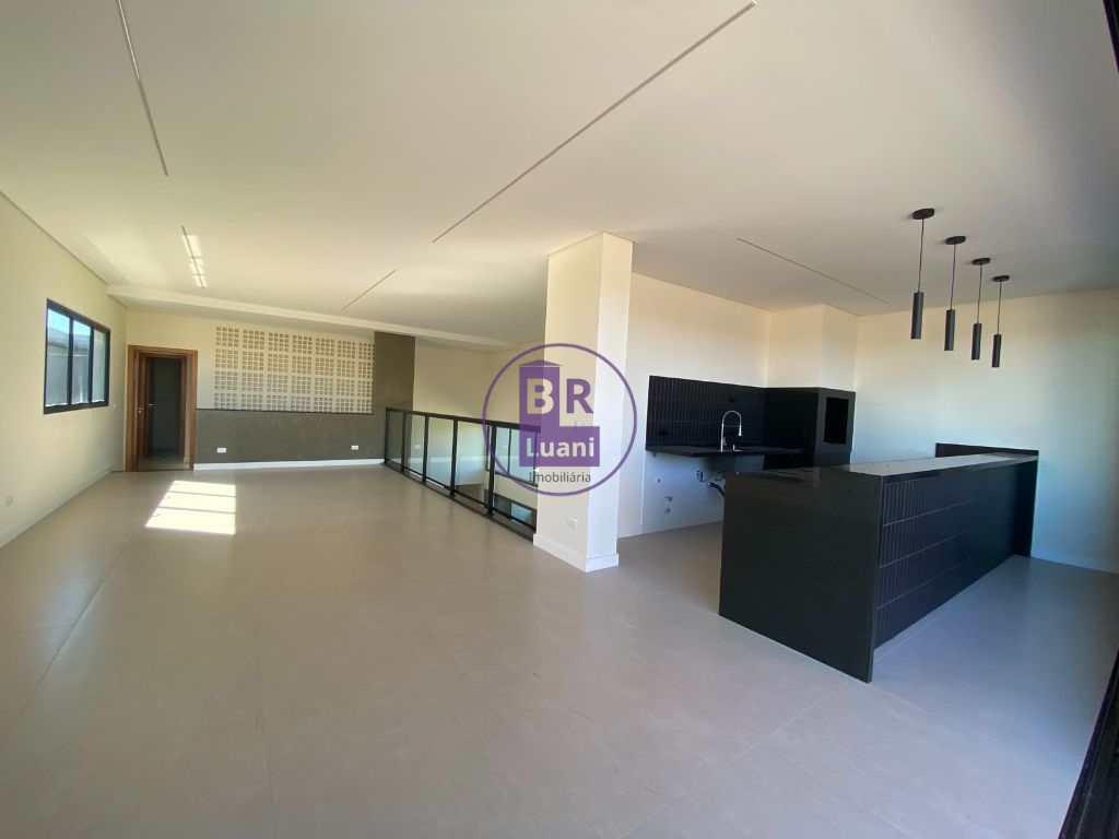 Residência Exclusiva com 4 Dormitórios e Espaço Gourmet no Condomínio Araçari.
