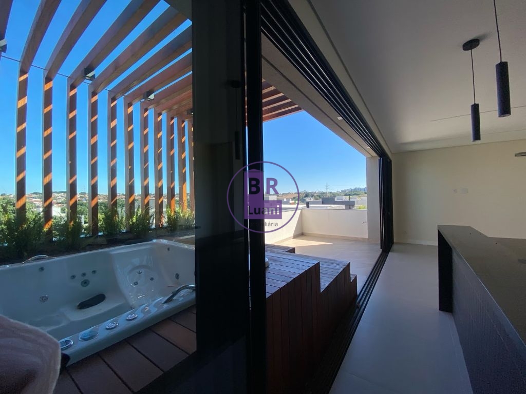 Residência Exclusiva com 4 Dormitórios e Espaço Gourmet no Condomínio Araçari.