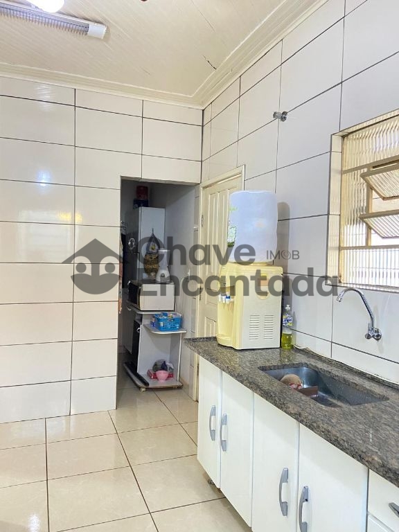 Casa no centro com quintal amplo e varanda coberta - foto 16