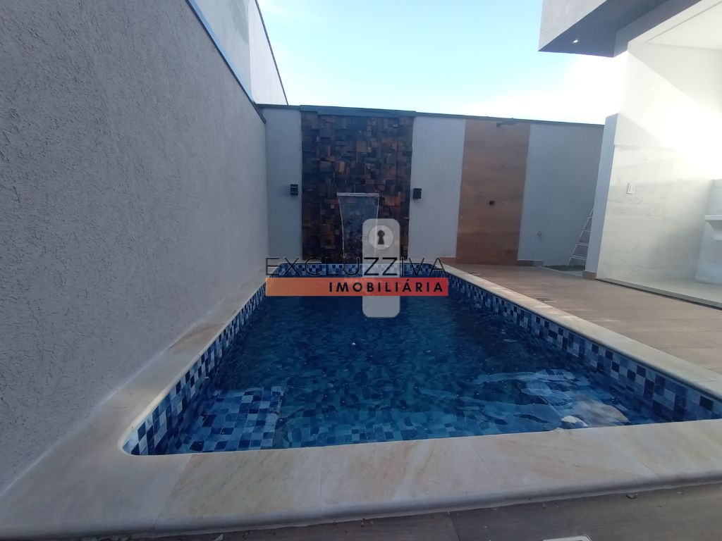 Casa em Condomínio à venda em Taubaté: 3 suítes, churrasqueira e piscina!