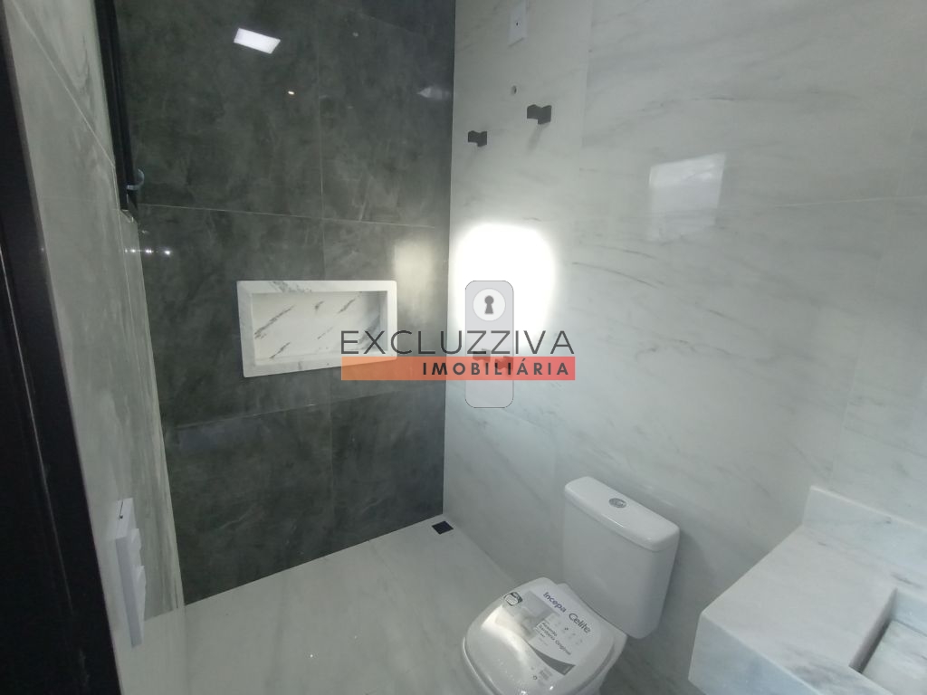 Casa em Condomínio à venda em Taubaté: 3 suítes, churrasqueira e piscina!