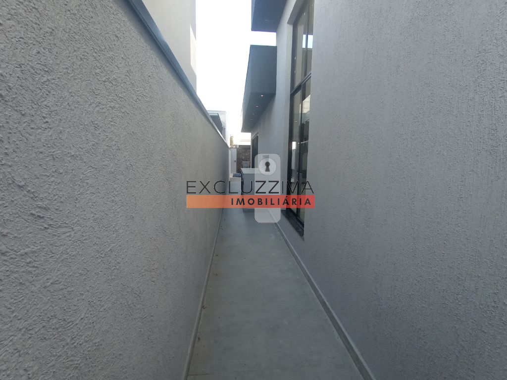 Casa em Condomínio à venda em Taubaté: 3 suítes, churrasqueira e piscina!