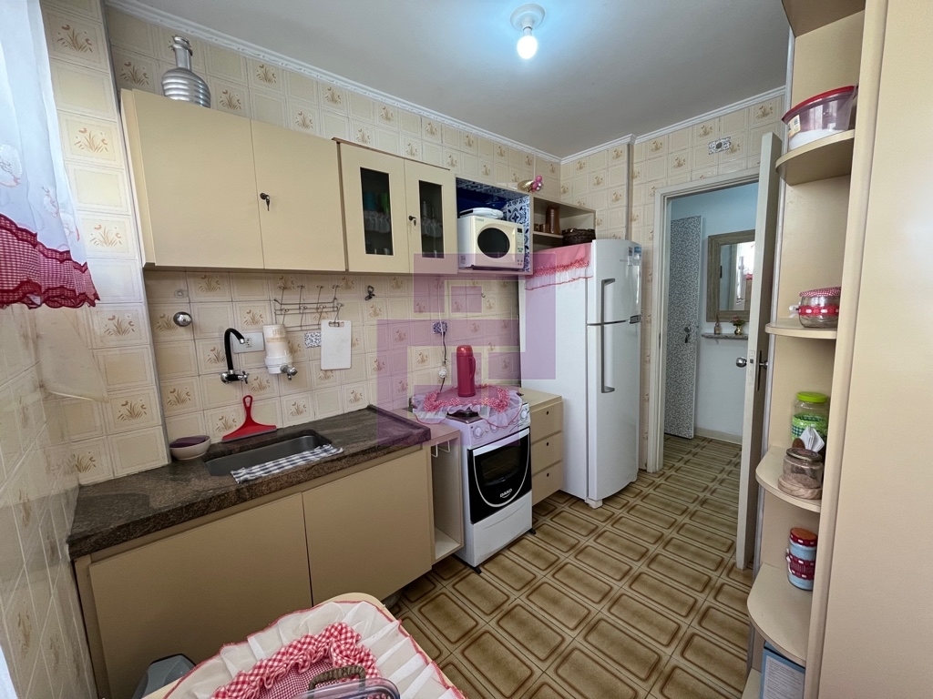 Praia da enseada, Apartamento com varanda sendo a vista livre, Travessa dom Pedro lado bairro