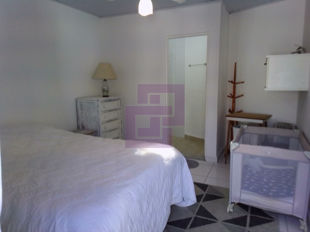 Venda de Casas / Padrão na cidade de Guarujá