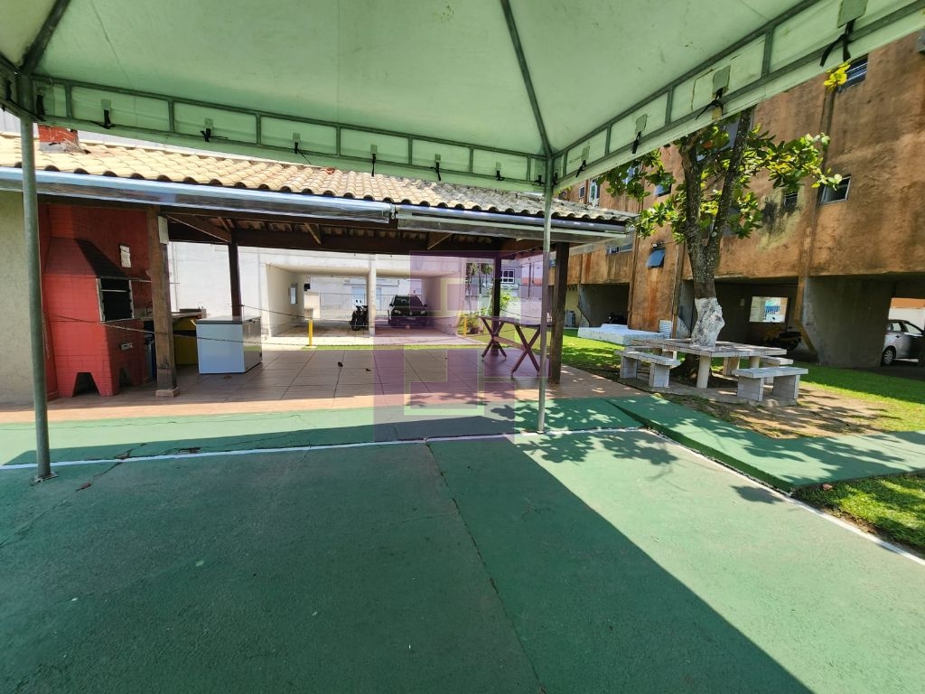 Apartamento à venda no Jardim dos Pássaros, Guarujá - 2 dormitórios, cozinha, garagem e mais!